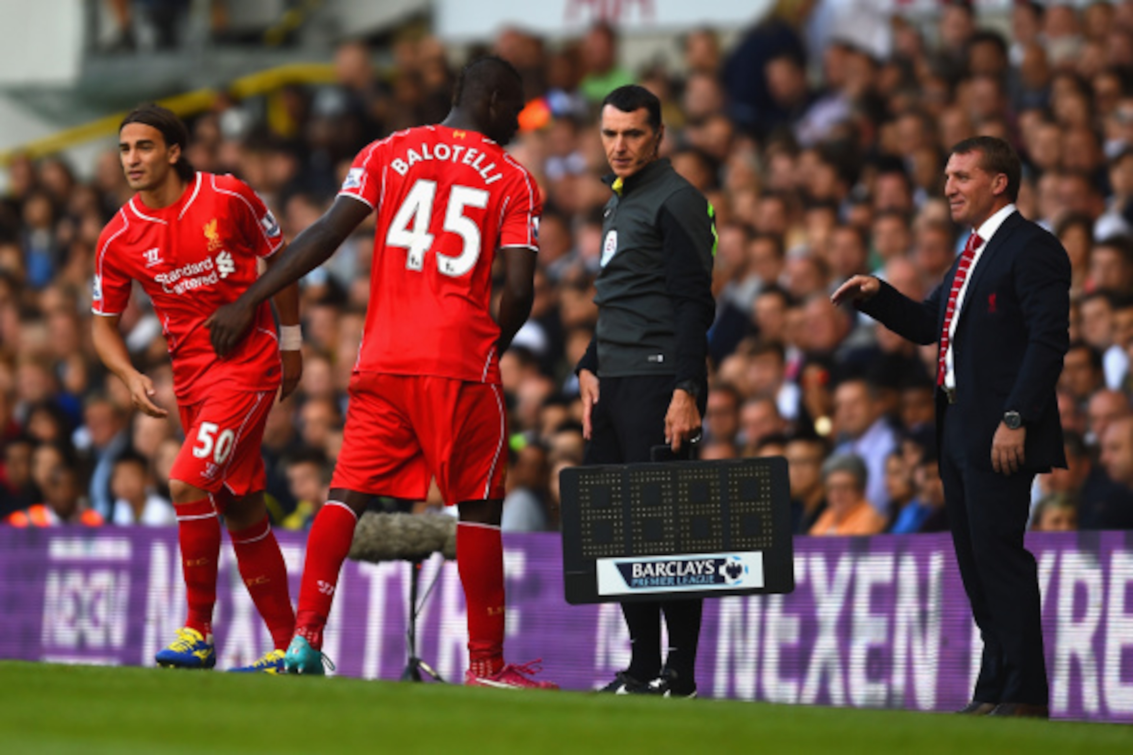 LONDON, ENGLAND - AUGUST 31:  Brendan Rodgers, manager of Liverpool looks on as Lazar Markovic of Liverpool replaces Mario Balotelli of Liverpool during the Barclays Premier League match between Tottenham Hotspur and Liverpool at White Hart Lane on August