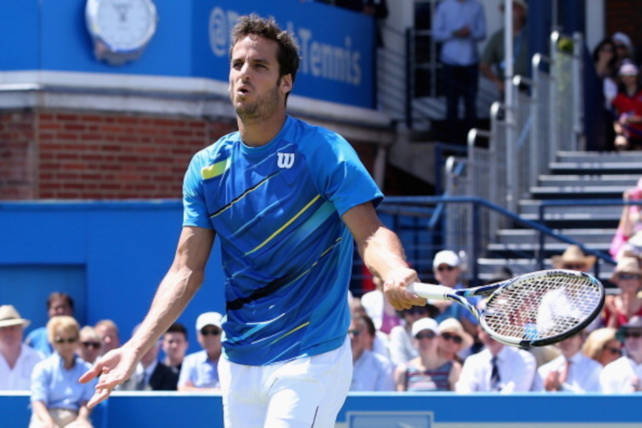 LONDON, ENGLAND - JUNE 10: Feliciano Lopez of Spain reacts in his match against Dusan Lajovic of Serbia during their Men's Singles match on day two of the Aegon Championships at Queens Club on June 10, 2014 in London, England. (Photo by Jan Kruger/Getty LONDON, ENGLAND - JUNE 10: Feliciano Lopez of Spain reacts in his match against Dusan Lajovic of Serbia during their Men's Singles match on day two of the Aegon Championships at Queens Club on June 10, 2014 in London, England. (Photo by Jan Kruger/Getty