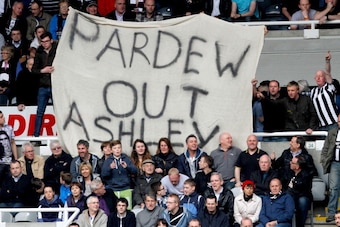 NEWCASTLE, ENGLAND-  May 03: Newcastle fans display a banner in protest against manager Alan Pardew and owner Mike Ashley during the Barclays Premier League match between Newcastle United and Cardiff City at St. James'  Park on May 03, 2014  in Newcastle 