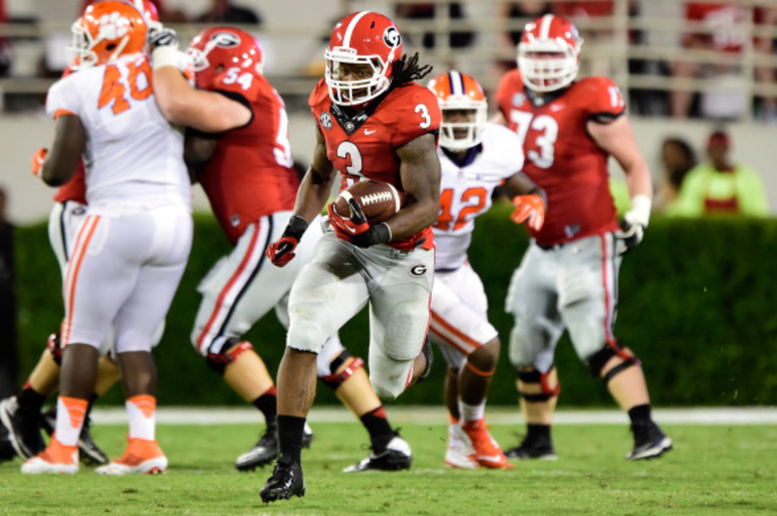 ATHENS, GA - AUGUST 30: Todd Gurley #3 of the Georgia Bulldogs carries the ball against the Clemson Tigers at Sanford Stadium on August 30, 2014 in Athens, Georgia. (Photo by Scott Cunningham/Getty Images)