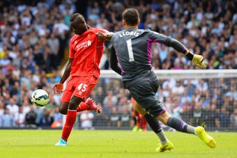 LONDON, ENGLAND - AUGUST 31:  Mario Balotelli of Liverpool shoots at an open goal past Hugo Lloris of Spurs during the Barclays Premier League match between Tottenham Hotspur and Liverpool at White Hart Lane on August 31, 2014 in London, England.  (Photo 