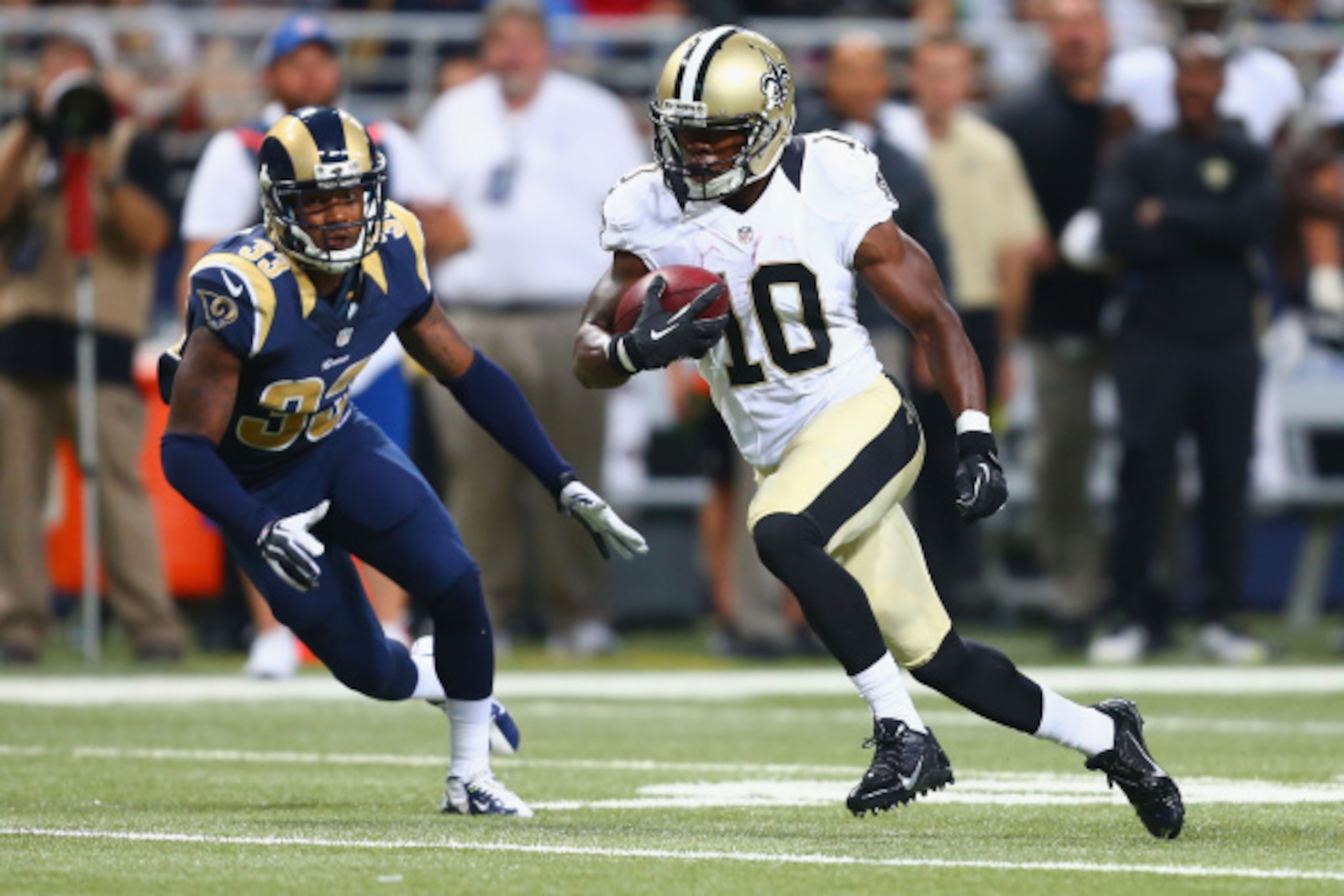 ST. LOUIS, MO - AUGUST 8: Brandin Cooks #10 of the New Orleans Saints runs upfield after making a catch against E.J. Gaines #33 of the St. Louis Rams during the second half of a pre-season game at the Edward Jones Dome on August 8, 2013 in St. Louis, Miss ST. LOUIS, MO - AUGUST 8: Brandin Cooks #10 of the New Orleans Saints runs upfield after making a catch against E.J. Gaines #33 of the St. Louis Rams during the second half of a pre-season game at the Edward Jones Dome on August 8, 2013 in St. Louis, Miss