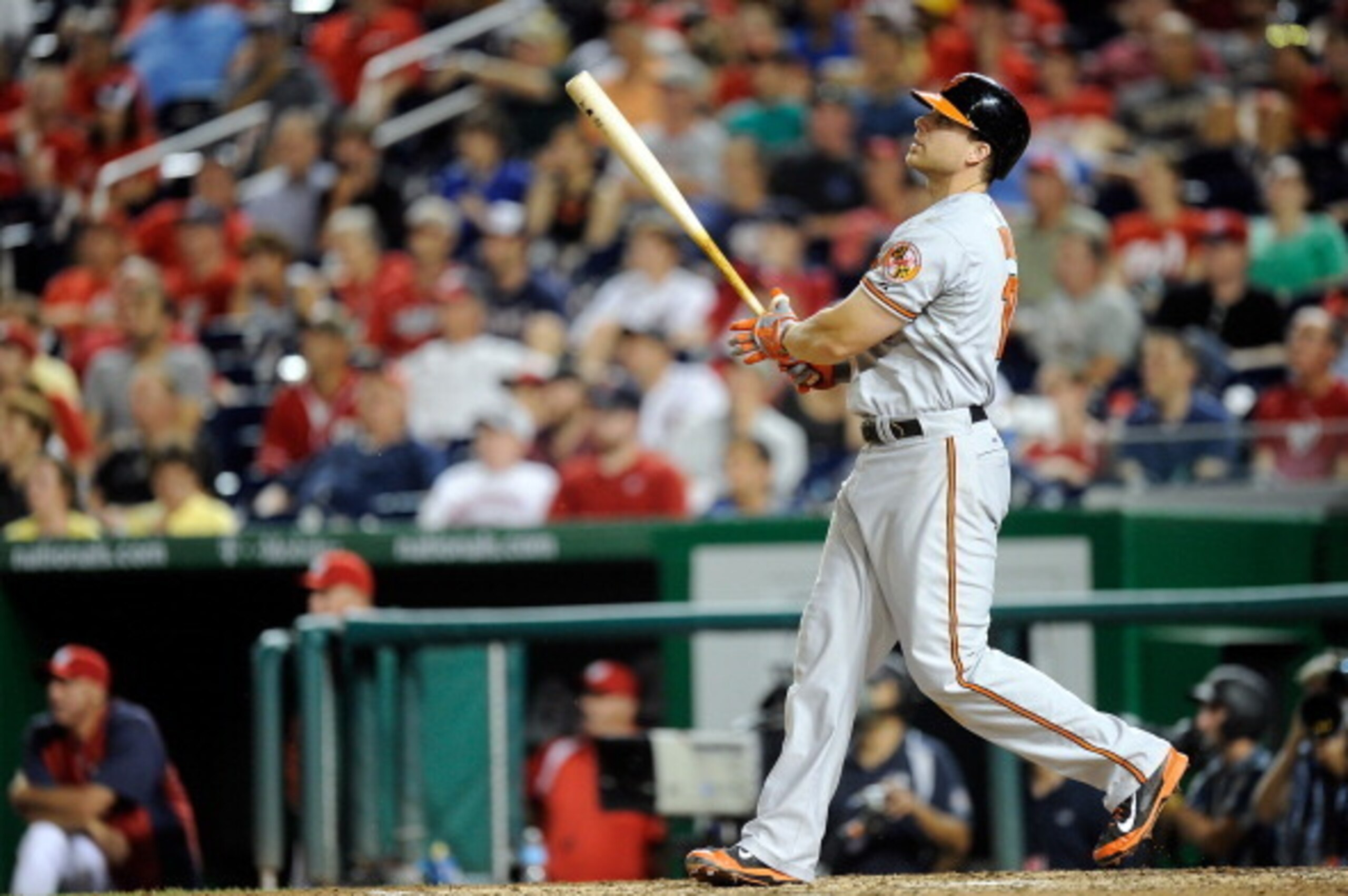 WASHINGTON, DC - JULY 07:  Chris Davis #19 of the Baltimore Orioles hits a home run in the eleventh inning against the Washington Nationals at Nationals Park on July 7, 2014 in Washington, DC. Baltimore won the game 8-2. (Photo by Greg Fiume/Getty Images)