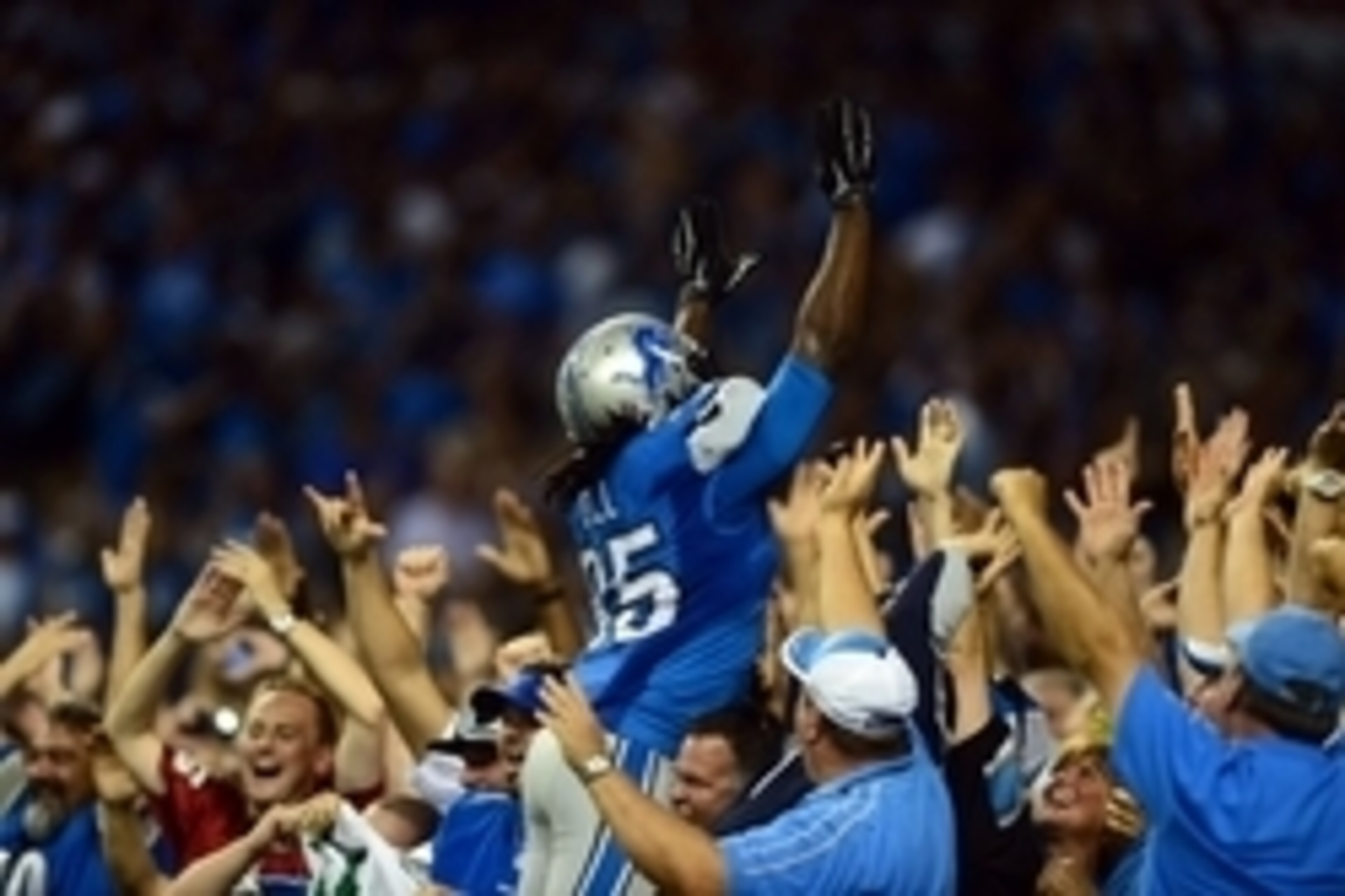 Sep 8, 2014; Detroit, MI, USA; Detroit Lions running back Joique Bell (35) celebrates after a touchdown during the fourth quarter against the New York Giants at Ford Field. Mandatory Credit: Andrew Weber-USA TODAY Sports