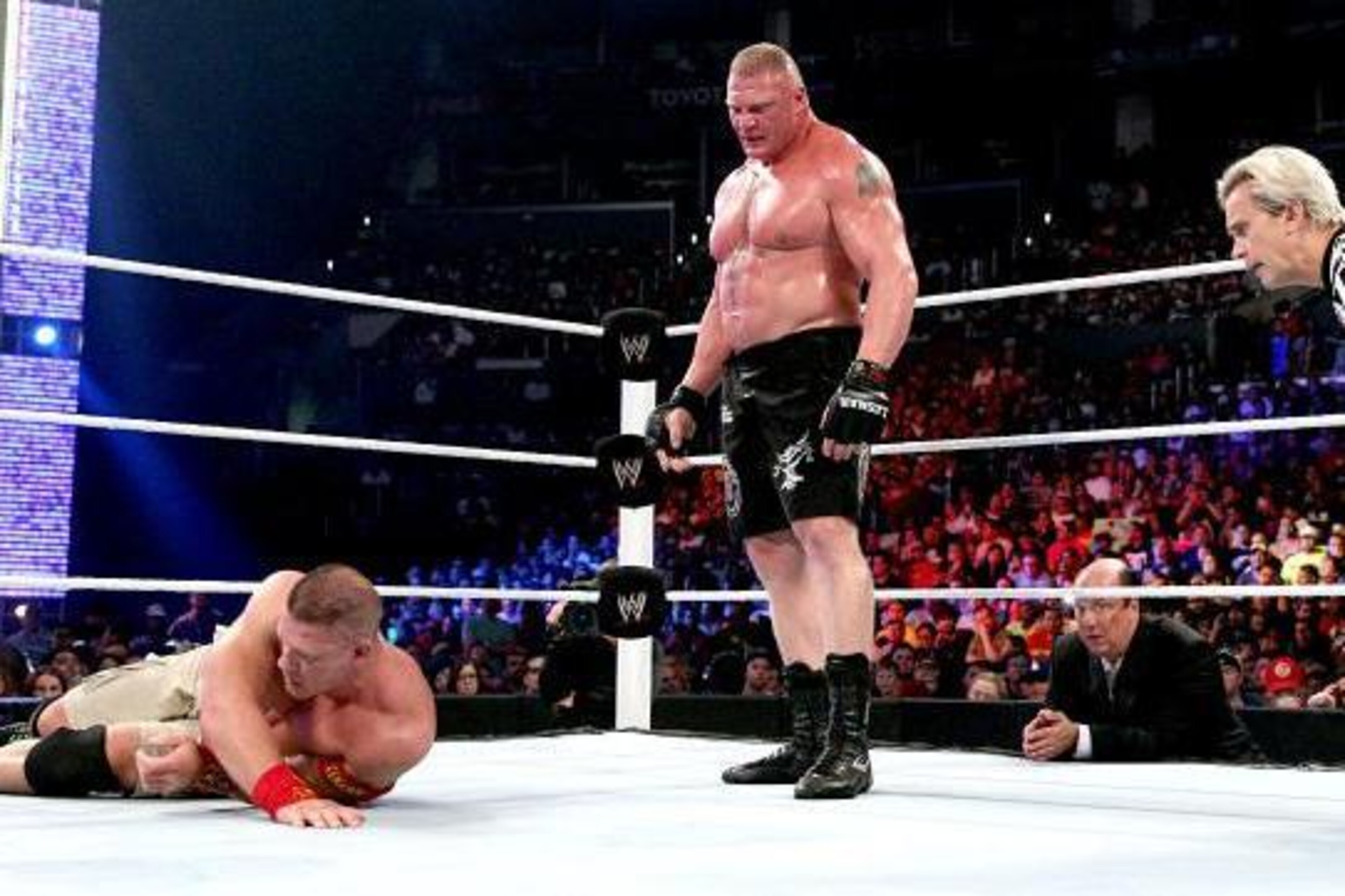 Brock Lesnar eyes his prey John Cena at SummerSlam.