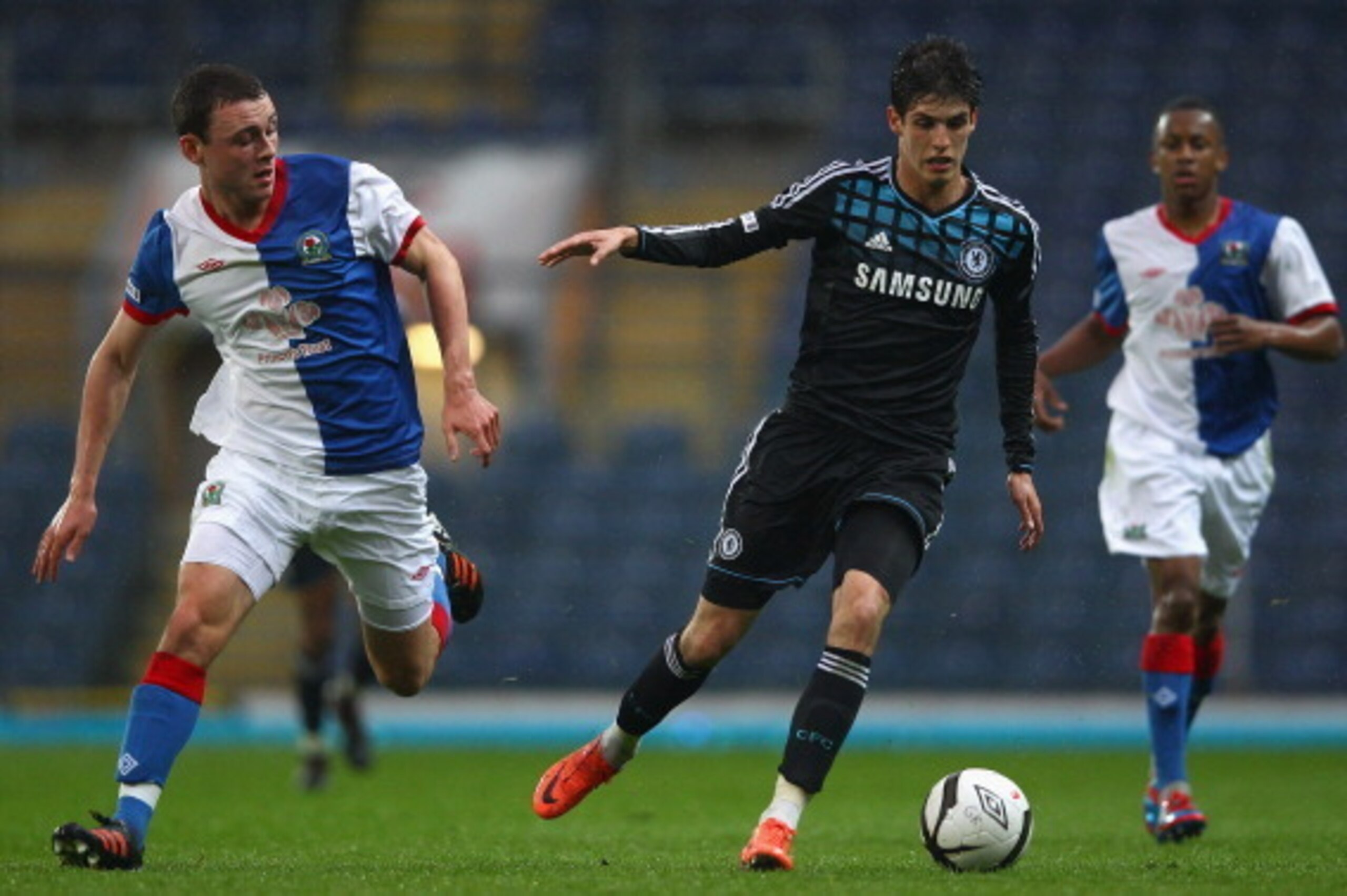 BLACKBURN, ENGLAND - MAY 09:  Lucas Piazon of Chelsea in action with Kellen Daly of Blackburn Rovers during the FA Youth Cup Final 2nd leg match between Blackburn Rovers U18's and Chelsea U18's at Ewood park on May 9, 2012 in Blackburn, England.  (Photo b