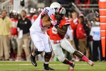 COLUMBUS, OH - OCTOBER 26:  Noah Spence #8 of the Ohio State Buckeyes rushes against the Penn State Nittany Lions at Ohio Stadium on October 26, 2013 in Columbus, Ohio.  (Photo by Jamie Sabau/Getty Images)