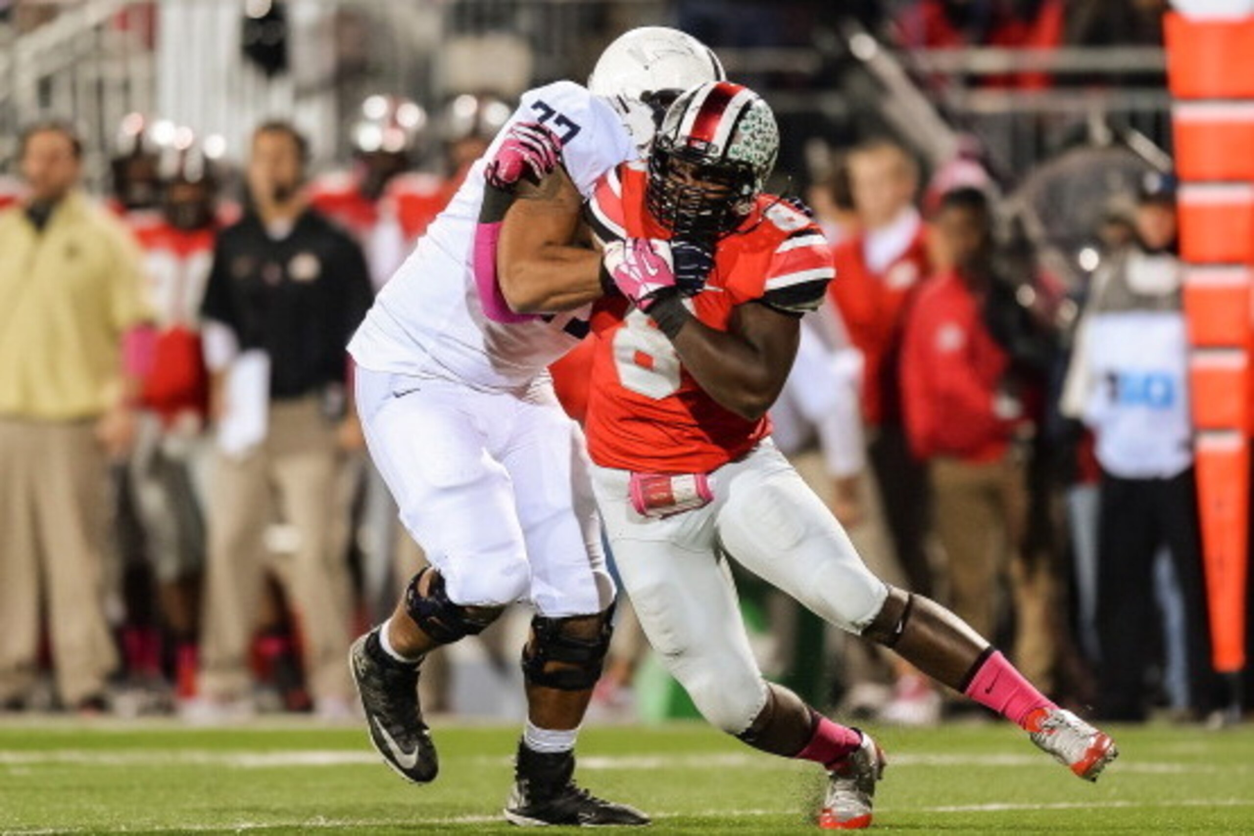 COLUMBUS, OH - OCTOBER 26:  Noah Spence #8 of the Ohio State Buckeyes rushes against the Penn State Nittany Lions at Ohio Stadium on October 26, 2013 in Columbus, Ohio.  (Photo by Jamie Sabau/Getty Images)