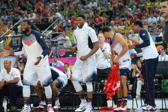BARCELONA, SPAIN - SEPTEMBER 11: Andre Drummond #15, Rudy Gay #8 of the USA Basketball Men's National Team cheers against the Lithuania National Team during the 2014 FIBA World Cup Semi-Finals at Palau Sant Jordi on September 11, 2014 in Barcelona, Spain.