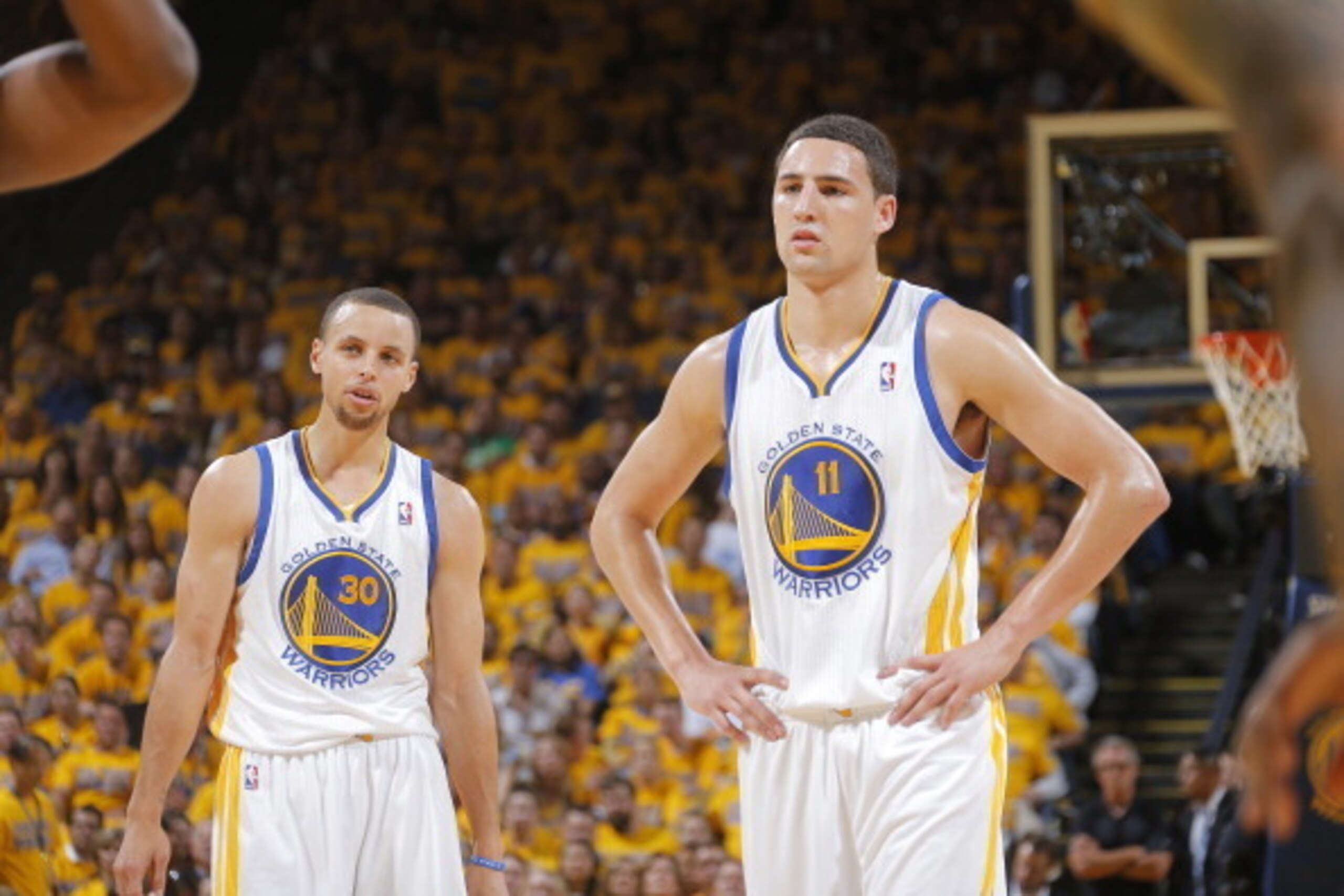 OAKLAND, CA - MAY 1: Stephen Curry #30 and Klay Thompson #11 of the Golden State Warriors in a game against the Los Angeles Clippers in Game Six of the Western Conference Quarterfinals during the 2014 NBA Playoffs at Oracle Arena on May 1, 2014 in Oakland