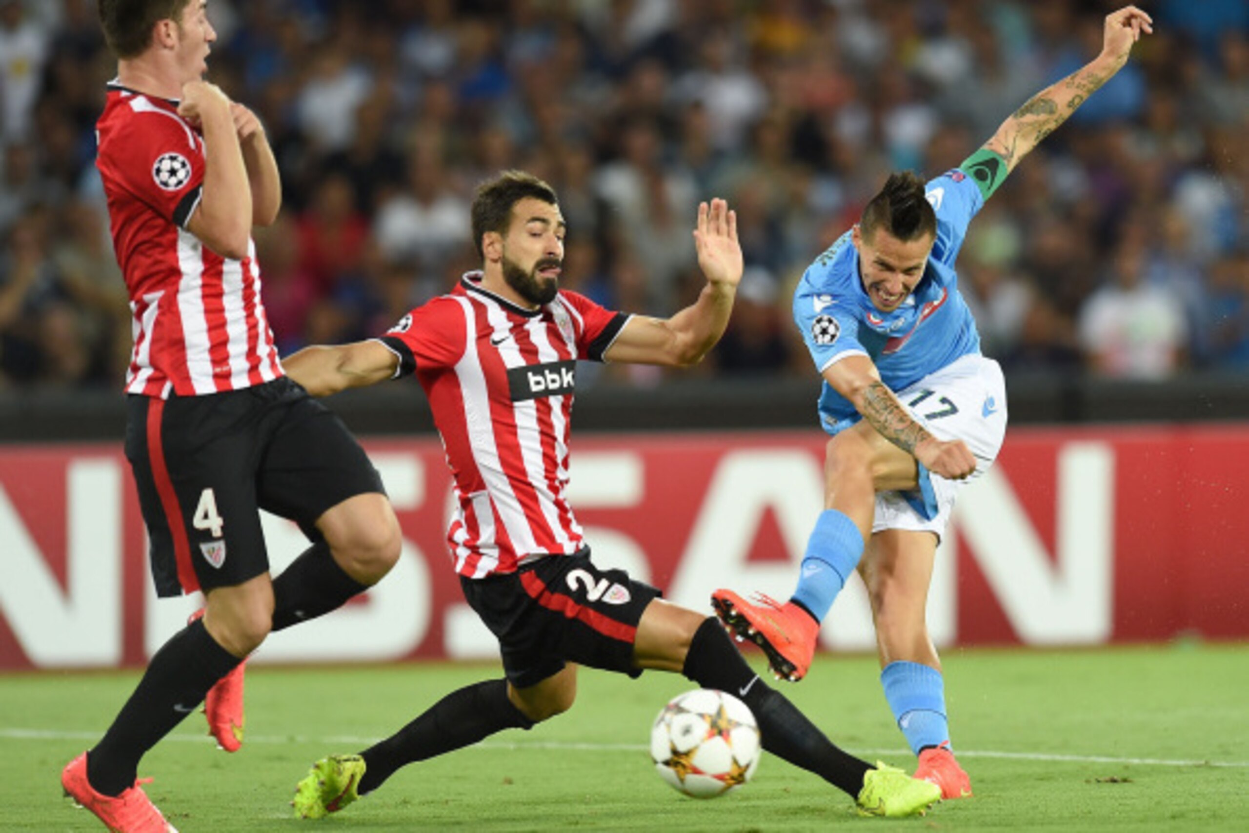 NAPLES, ITALY - AUGUST 19:  Mikel Balenziaga of Athletic Bilbao and Marek Hamsik of Napoli in action during the first leg of UEFA Champions League qualifying play-offs round match between SSC Napoli and Athletic Club on August 19, 2014 in Naples, Italy.  