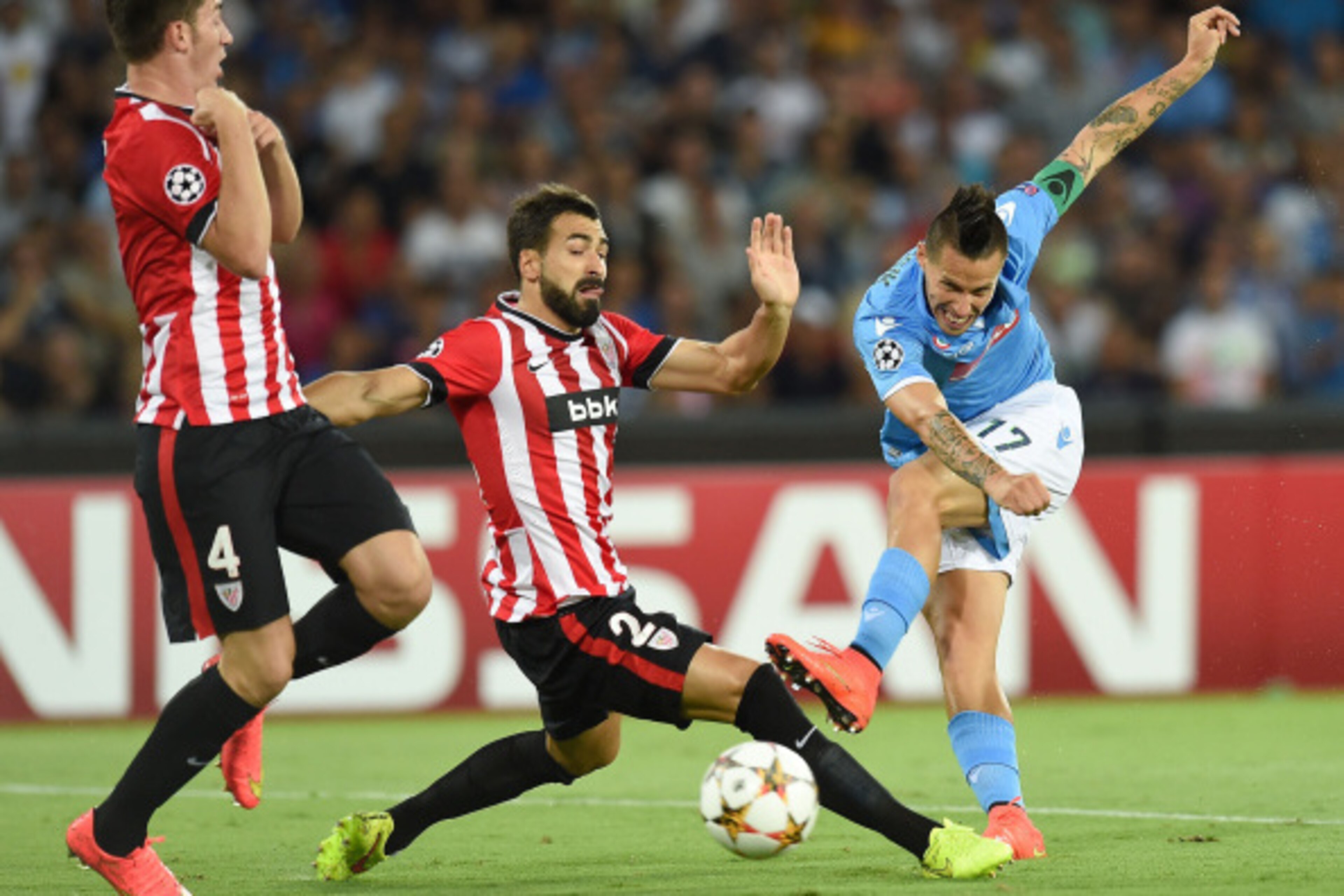 NAPLES, ITALY - AUGUST 19:  Mikel Balenziaga of Athletic Bilbao and Marek Hamsik of Napoli in action during the first leg of UEFA Champions League qualifying play-offs round match between SSC Napoli and Athletic Club on August 19, 2014 in Naples, Italy.  