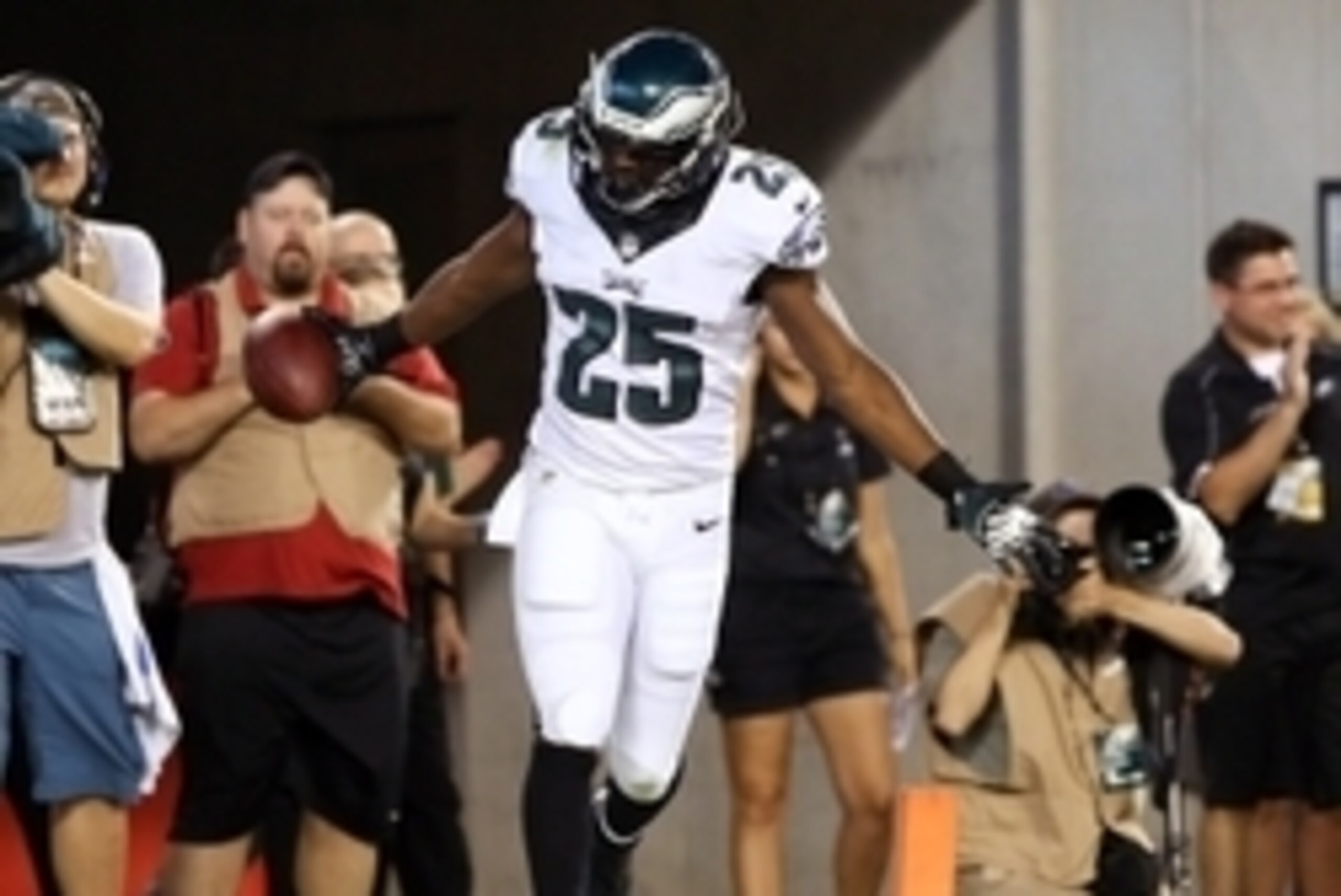 Aug 21, 2014; Philadelphia, PA, USA; Philadelphia Eagles running back LeSean McCoy (25) celebrates a touchdown during the first quarter of a game against the Pittsburgh Steelers at Lincoln Financial Field. Mandatory Credit: Bill Streicher-USA TODAY Sports