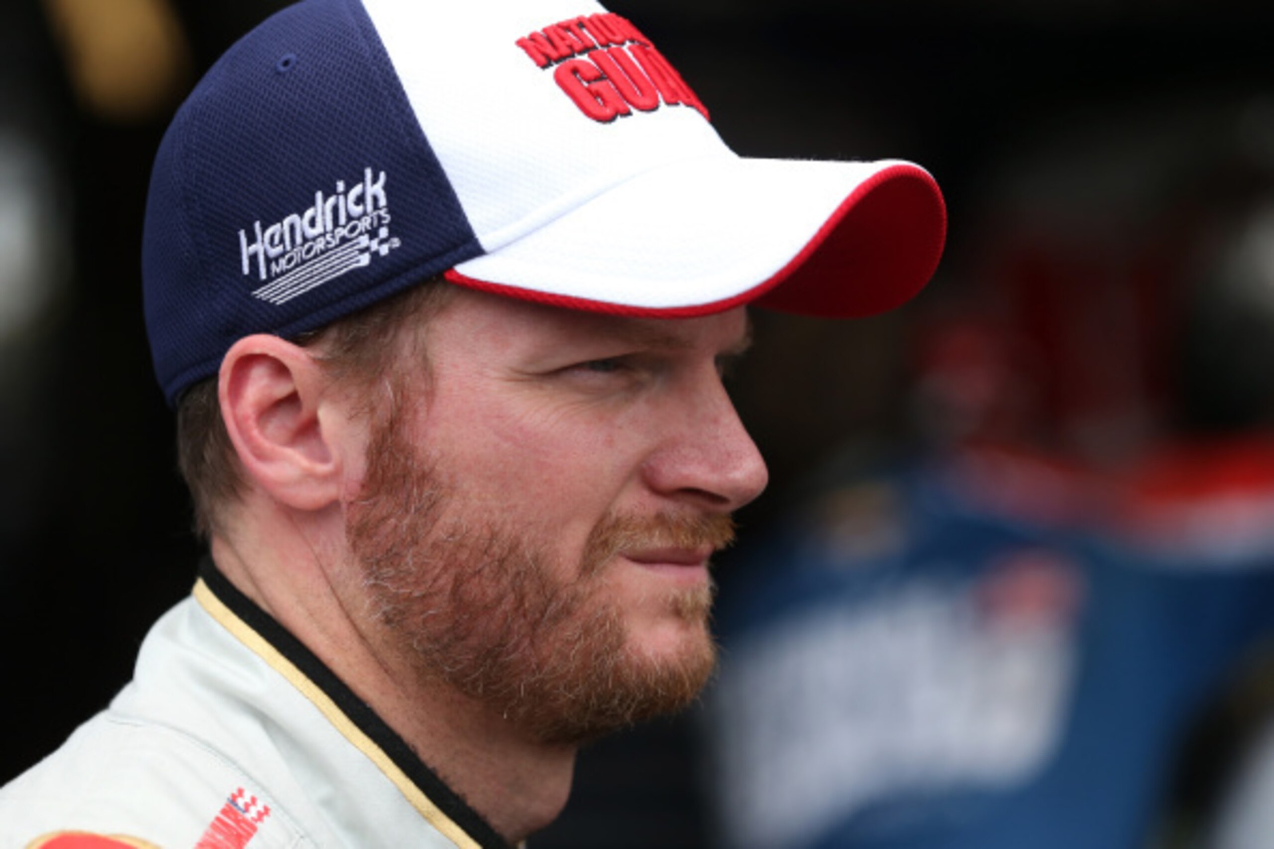 JOLIET, IL - SEPTEMBER 12: Dale Earnhardt Jr., driver of the #88 National Guard Chevrolet, stands in the garage area during practice for the NASCAR Sprint Cup Series MyAFibStory.com 400 at Chicagoland Speedway on September 12, 2014 in Joliet, Illinois. JOLIET, IL - SEPTEMBER 12: Dale Earnhardt Jr., driver of the #88 National Guard Chevrolet, stands in the garage area during practice for the NASCAR Sprint Cup Series MyAFibStory.com 400 at Chicagoland Speedway on September 12, 2014 in Joliet, Illinois.