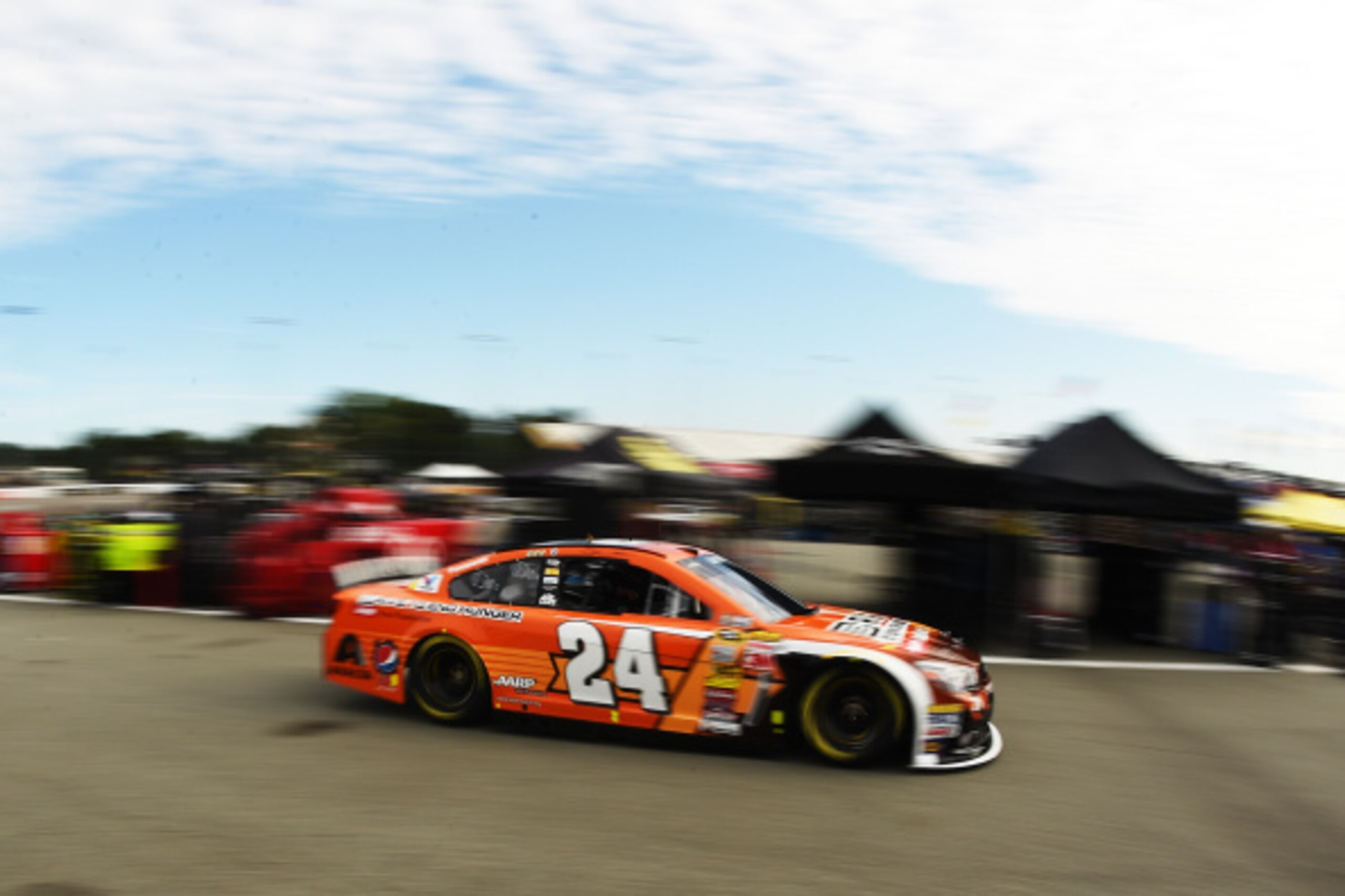 RICHMOND, VA - SEPTEMBER 05: Jeff Gordon, driver of the #24 Drive to End Hunger Chevrolet, drives through the garage area during practice for the NASCAR Sprint Cup Series Federated Auto Parts 400 at Richmond International Raceway on September 5, 2014 in RICHMOND, VA - SEPTEMBER 05: Jeff Gordon, driver of the #24 Drive to End Hunger Chevrolet, drives through the garage area during practice for the NASCAR Sprint Cup Series Federated Auto Parts 400 at Richmond International Raceway on September 5, 2014 in