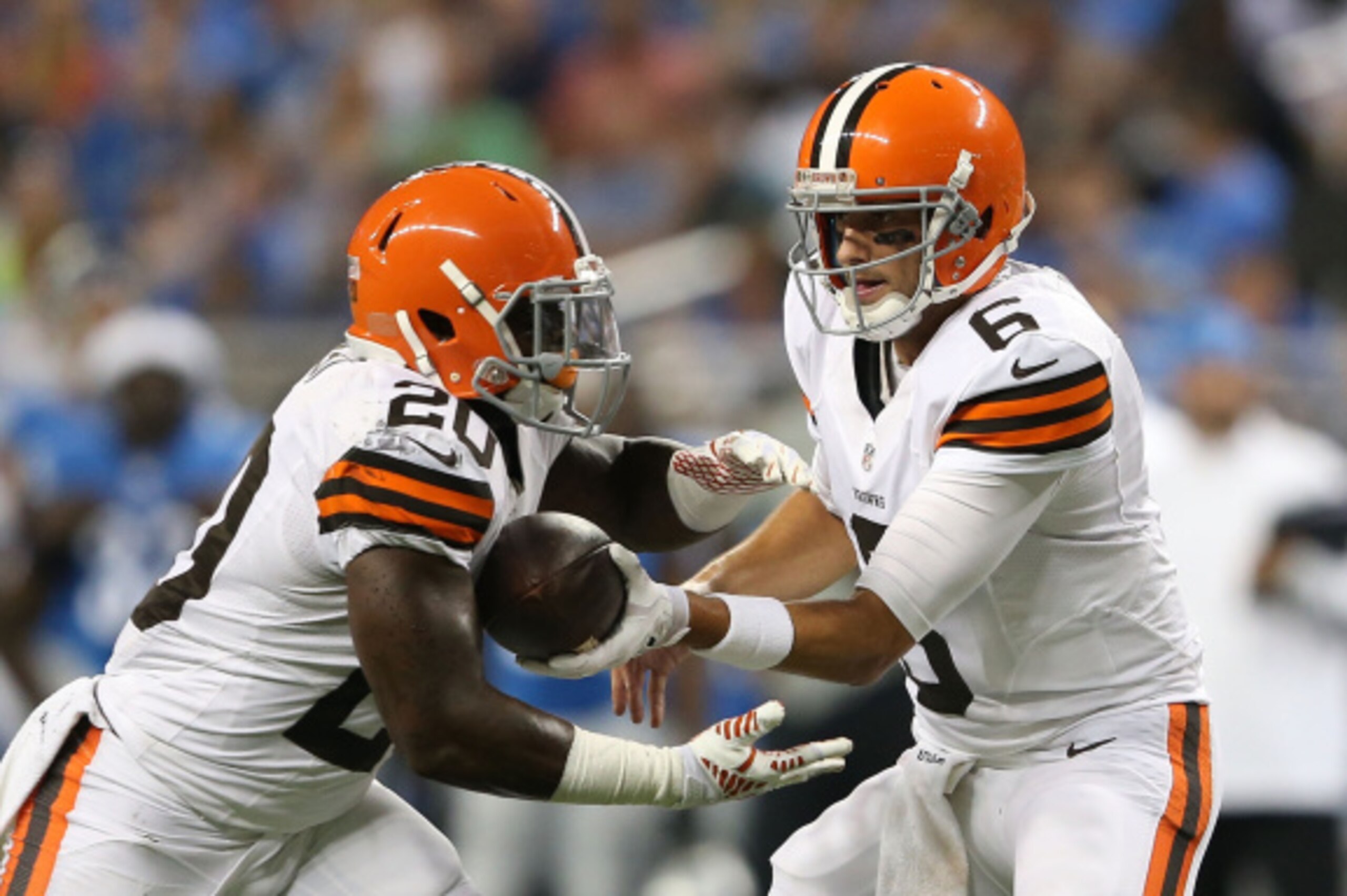 DETROIT, MI - AUGUST 09: Brian Hoyer #6 of the Cleveland Browns hands the ball off to running back Terrance West #20 during the first quarter of the preseason game against the Detroit Lions at Ford Field on August 9, 2014 in Detroit, Michigan. The Lions d
