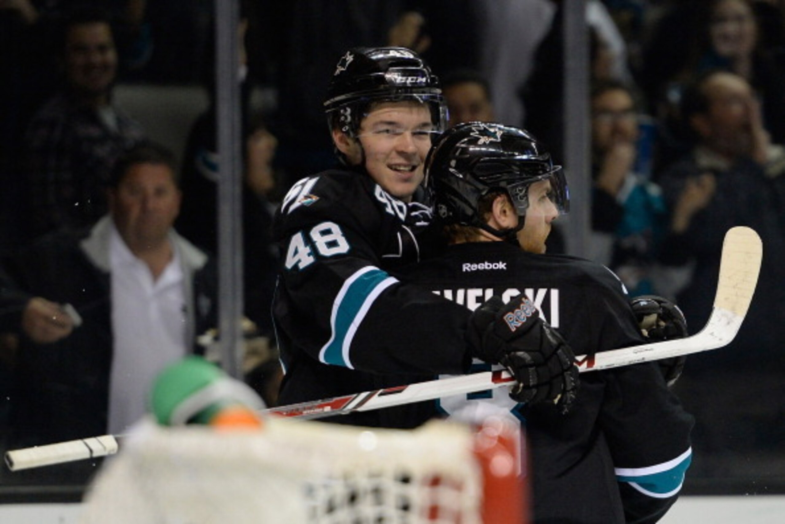 SAN JOSE, CA - DECEMBER 12:  Joe Pavelski #8 and Tomas Hertl #48 of the San Jose Sharks celebrates after Pavelski scored his second goal of the game against the Minnesota Wild during the second period at SAP Center on December 12, 2013 in San Jose, Califo