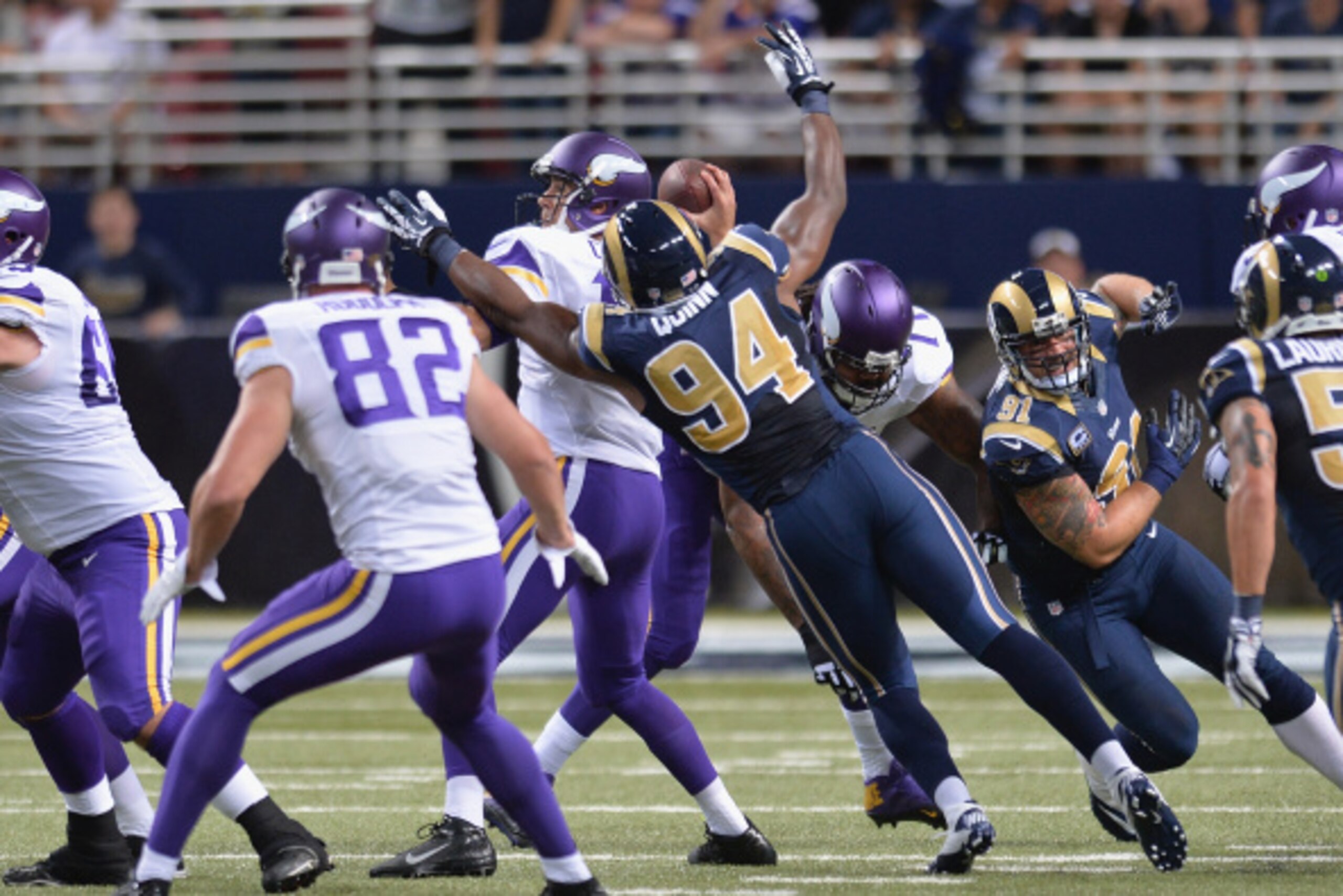 ST. LOUIS, MO - SEPTEMBER 7: Robert Quinn #94 of the St. Louis Rams pressures Matt Cassel #16 of the Minnesota Vikings in the first quarter at the Edward Jones Dome on September 7, 2014 in St. Louis, Missouri. (Photo by Michael B. Thomas/Getty Images)