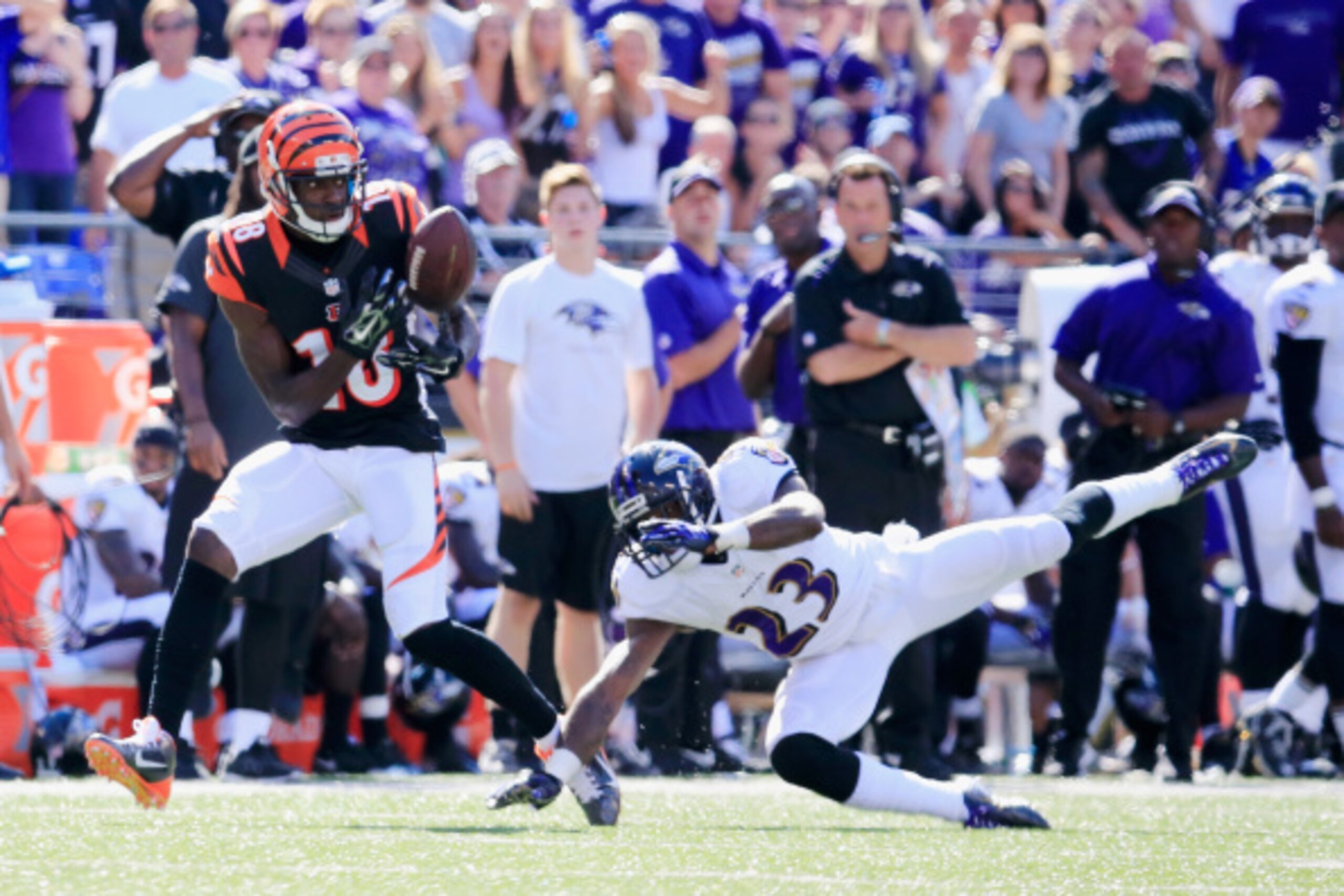BALTIMORE, MD - SEPTEMBER 07:  Wide receiver A.J. Green #18 of the Cincinnati Bengals catches a touchdown pass in front of defensive back Chykie Brown #23 of the Baltimore Ravens the second half of an NFL football game against the Baltimore Ravens at M&T 