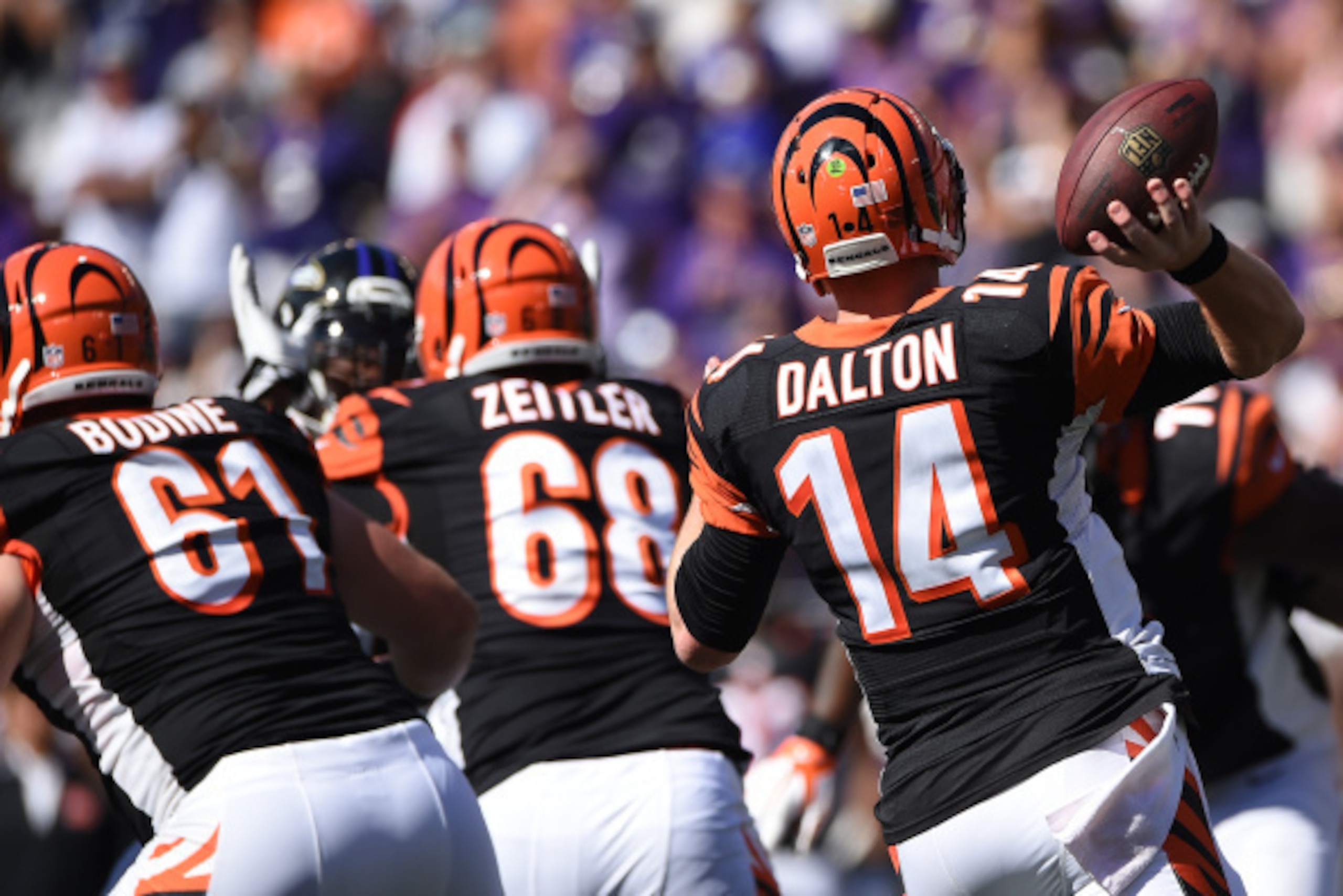 BALTIMORE, MD - SEPTEMBER 07: Quarterback Andy Dalton #14 of the Cincinnati Bengals passes against the Baltimore Ravens at M&T Bank Stadium on September 7, 2014 in Baltimore, Maryland. The Cincinnati Bengals won, 23-16. (Photo by Patrick Smith/Getty Image