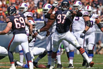 CHICAGO, IL - SEPTEMBER 07:  Willie Young #97 of the Chicago Bears celebrates a sack in the first quarter of their game against the Buffal Bills at Soldier Field on September 7, 2014 in Chicago, Illinois.  (Photo by Jonathan Daniel/Getty Images)