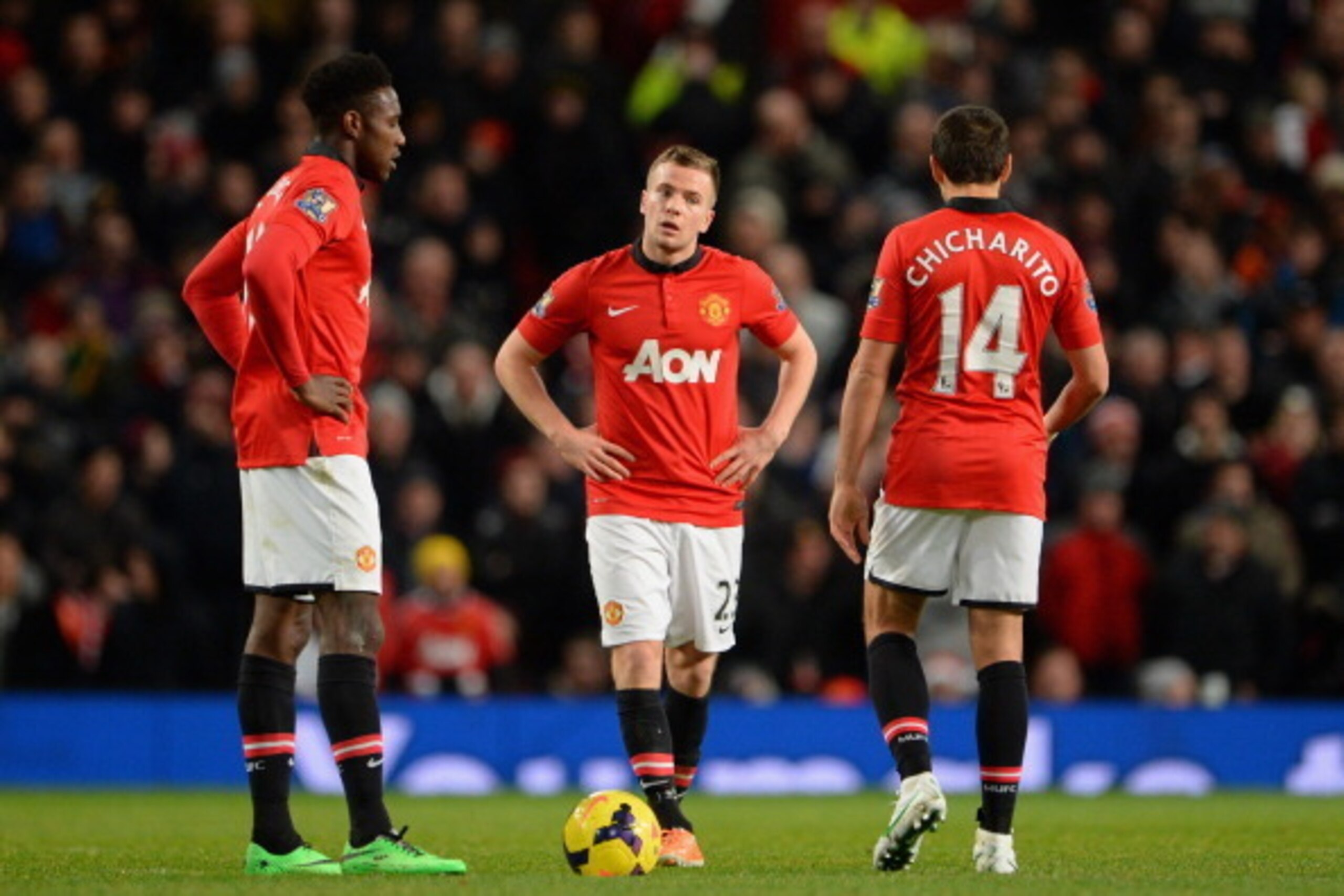 MANCHESTER, ENGLAND - JANUARY 01:  Tom Cleverley of Manchester United and his team-mate Danny Welbeck (l) react after conceding a second goal during the Barclays Premier League match between Manchester United and Tottenham Hotspur at Old Trafford on Janua