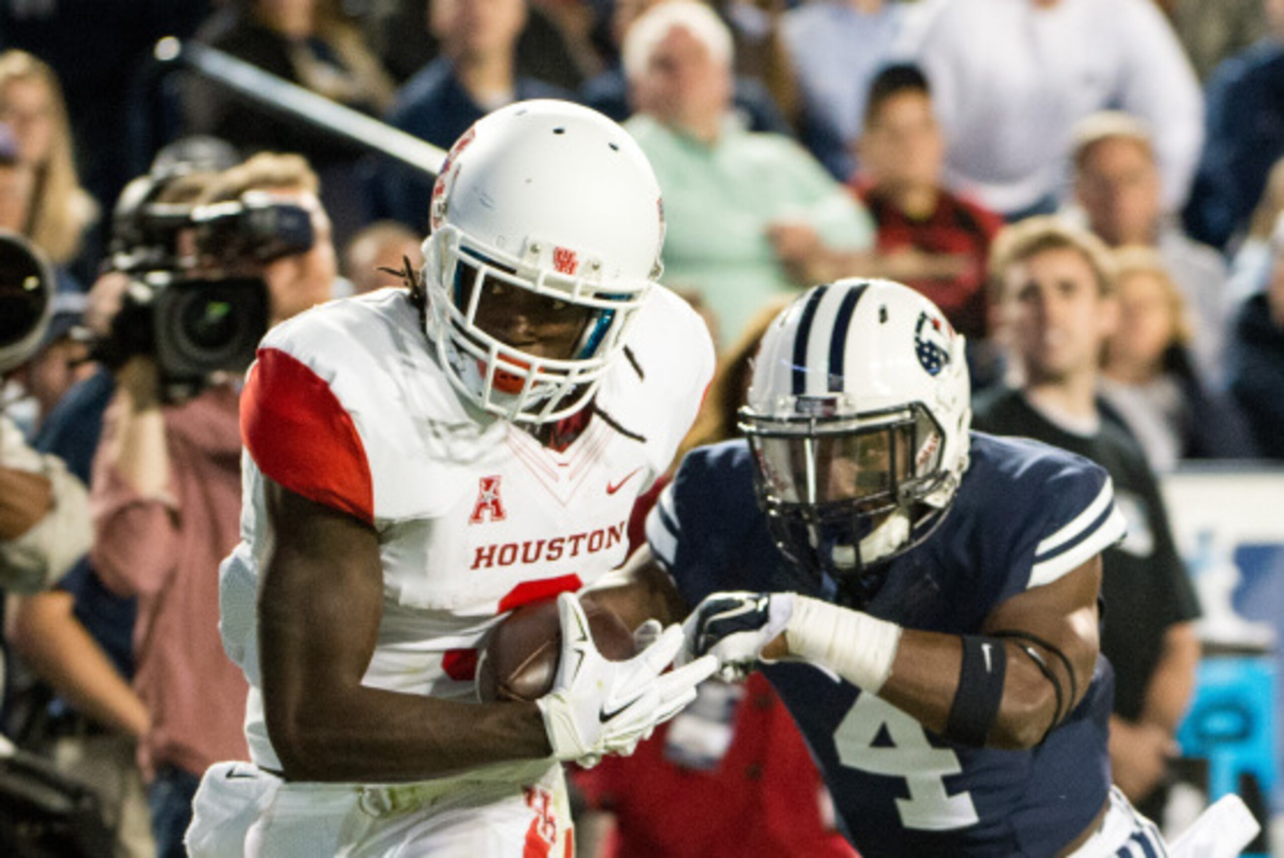 PROVO, UT - SEPTEMBER 11: Wide receiver Deontay Greenberry #3 of the University of Houston Cougars catches a 15-yard pass in the end zone during the fourth quarter as defensive back Robertson Danieal #4 defends on September 11, 2014 at LaVell Edwards Sta PROVO, UT - SEPTEMBER 11: Wide receiver Deontay Greenberry #3 of the University of Houston Cougars catches a 15-yard pass in the end zone during the fourth quarter as defensive back Robertson Danieal #4 defends on September 11, 2014 at LaVell Edwards Sta