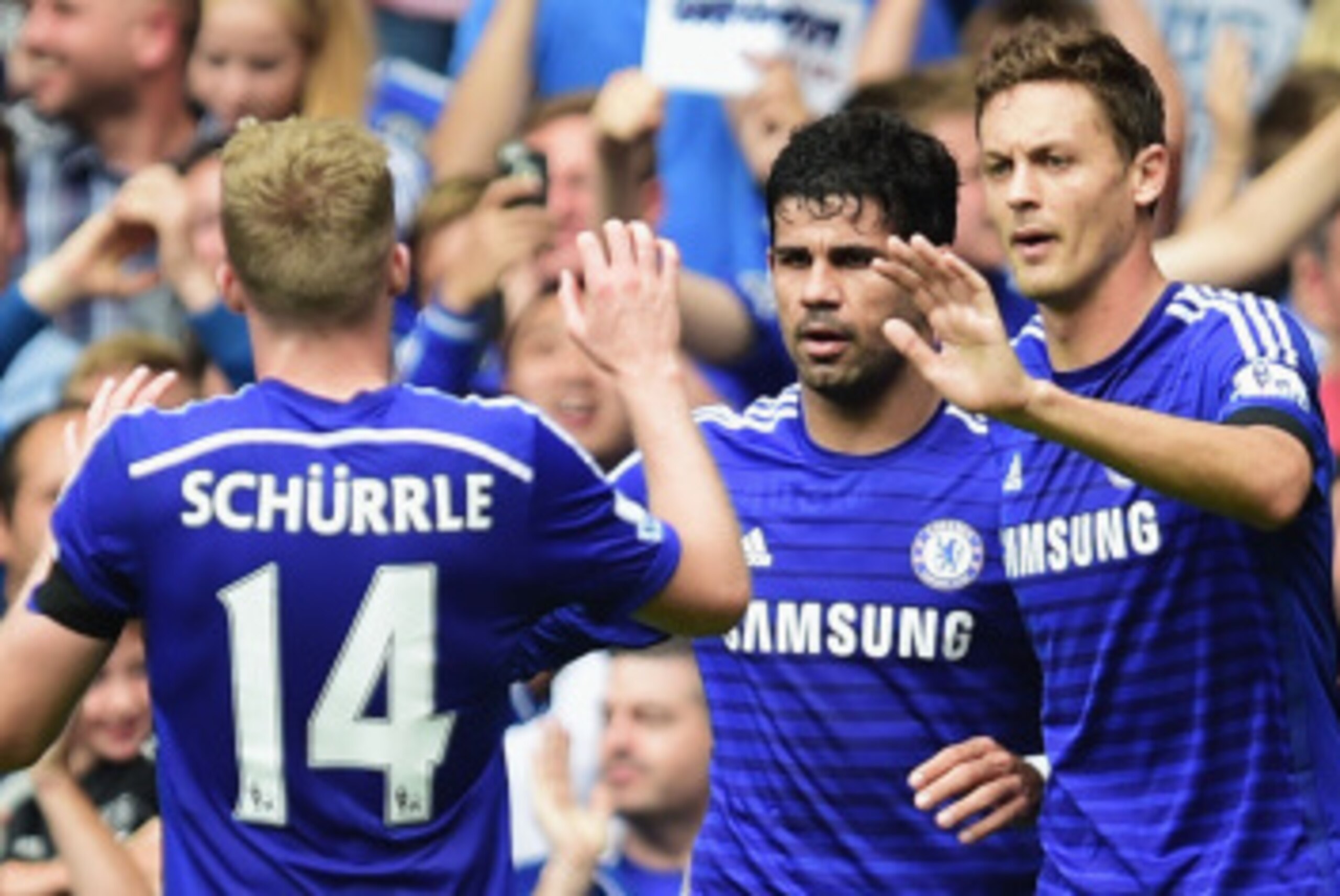 LONDON, ENGLAND - SEPTEMBER 13: Diego Costa of Chelsea celebrates with Nemanja Matic (21) and Andre Schuerrle (14) as he scores their first goal during the Barclays Premier League match between Chelsea and Swansea City at Stamford Bridge on September 13, LONDON, ENGLAND - SEPTEMBER 13: Diego Costa of Chelsea celebrates with Nemanja Matic (21) and Andre Schuerrle (14) as he scores their first goal during the Barclays Premier League match between Chelsea and Swansea City at Stamford Bridge on September 13,