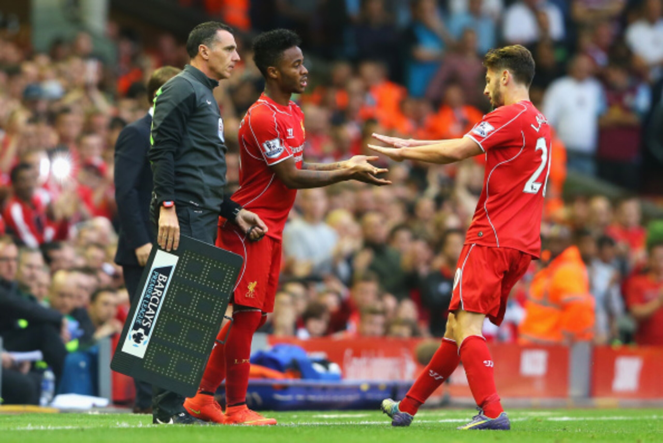 LIVERPOOL, ENGLAND - SEPTEMBER 13: Raheem Sterling of Liverpool comes on for Adam Lallana of Liverpool during the Barclays Premier League match between Liverpool and Aston Villa at Anfield on September 13, 2014 in Liverpool, England.  (Photo by Alex Lives