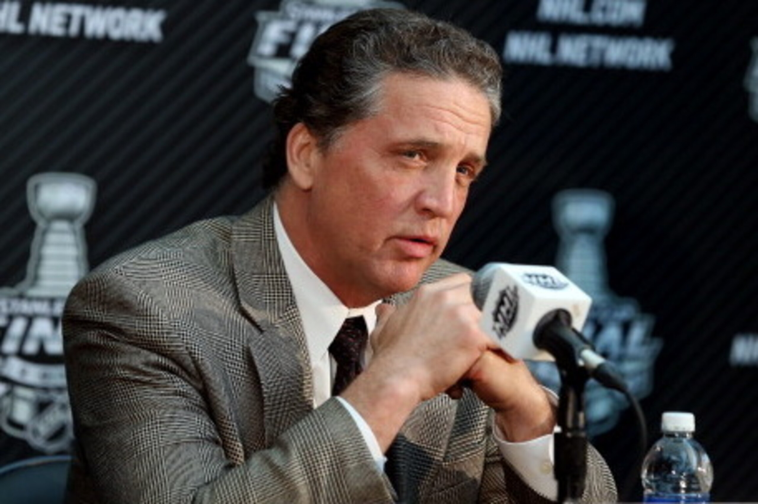 LOS ANGELES, CA - JUNE 03:  Dean Lombardi, President and General Manager of the Los Angeles Kings, speaks during Media Day for the 2014 NHL Stanley Cup Final at Staples Center on June 3, 2014 in Los Angeles, California.  (Photo by Bruce Bennett/Getty Imag