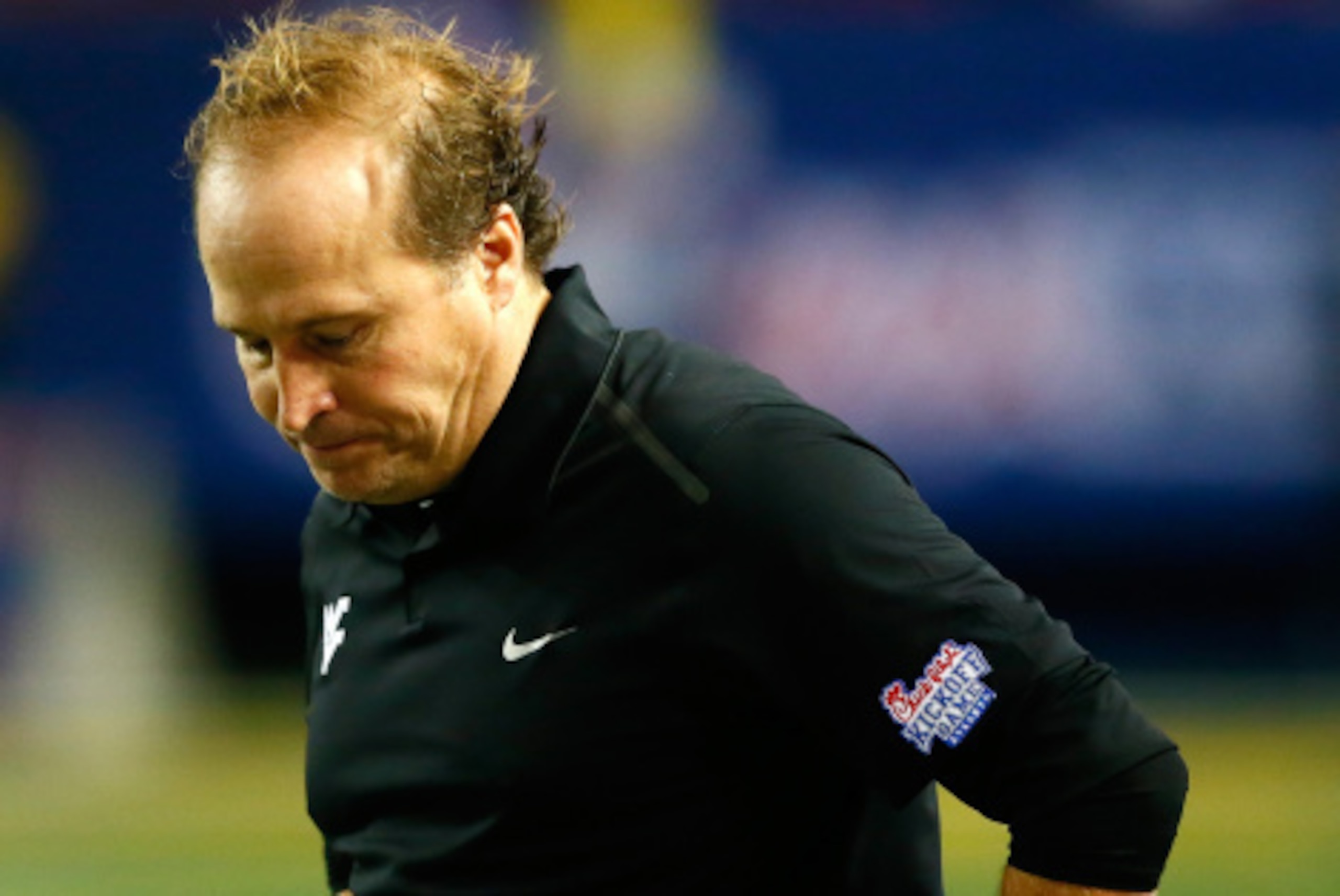 ATLANTA, GA - AUGUST 30:  Head coach Dana Holgorsen of the West Virginia Mountaineers reacts during the game against the Alabama Crimson Tide at Georgia Dome on August 30, 2014 in Atlanta, Georgia.  (Photo by Kevin C. Cox/Getty Images)