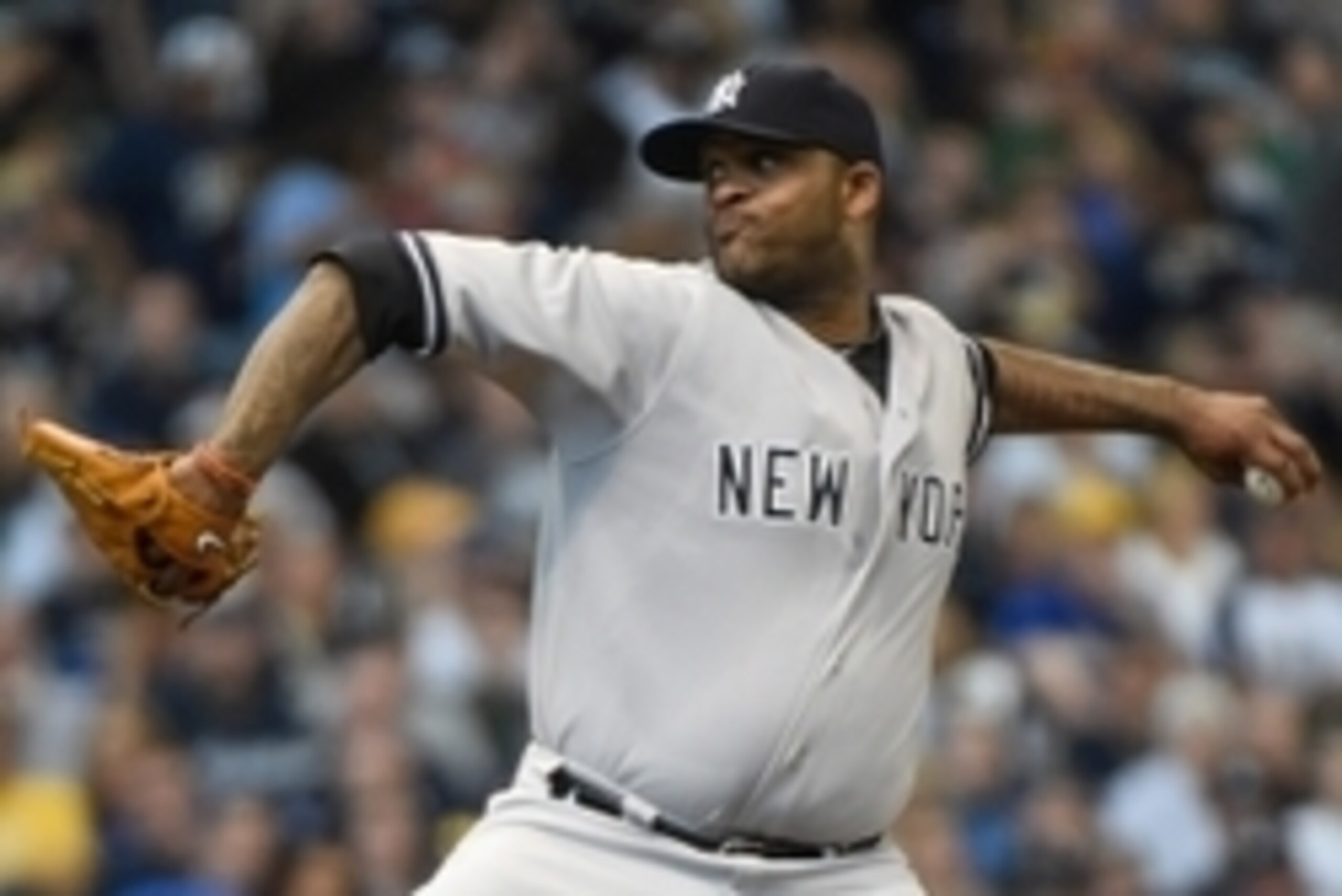 May 10, 2014; Milwaukee, WI, USA; New York Yankees pitcher CC Sabathia (52) pitches in the first inning against the Milwaukee Brewers at Miller Park. Mandatory Credit: Benny Sieu-USA TODAY Sports