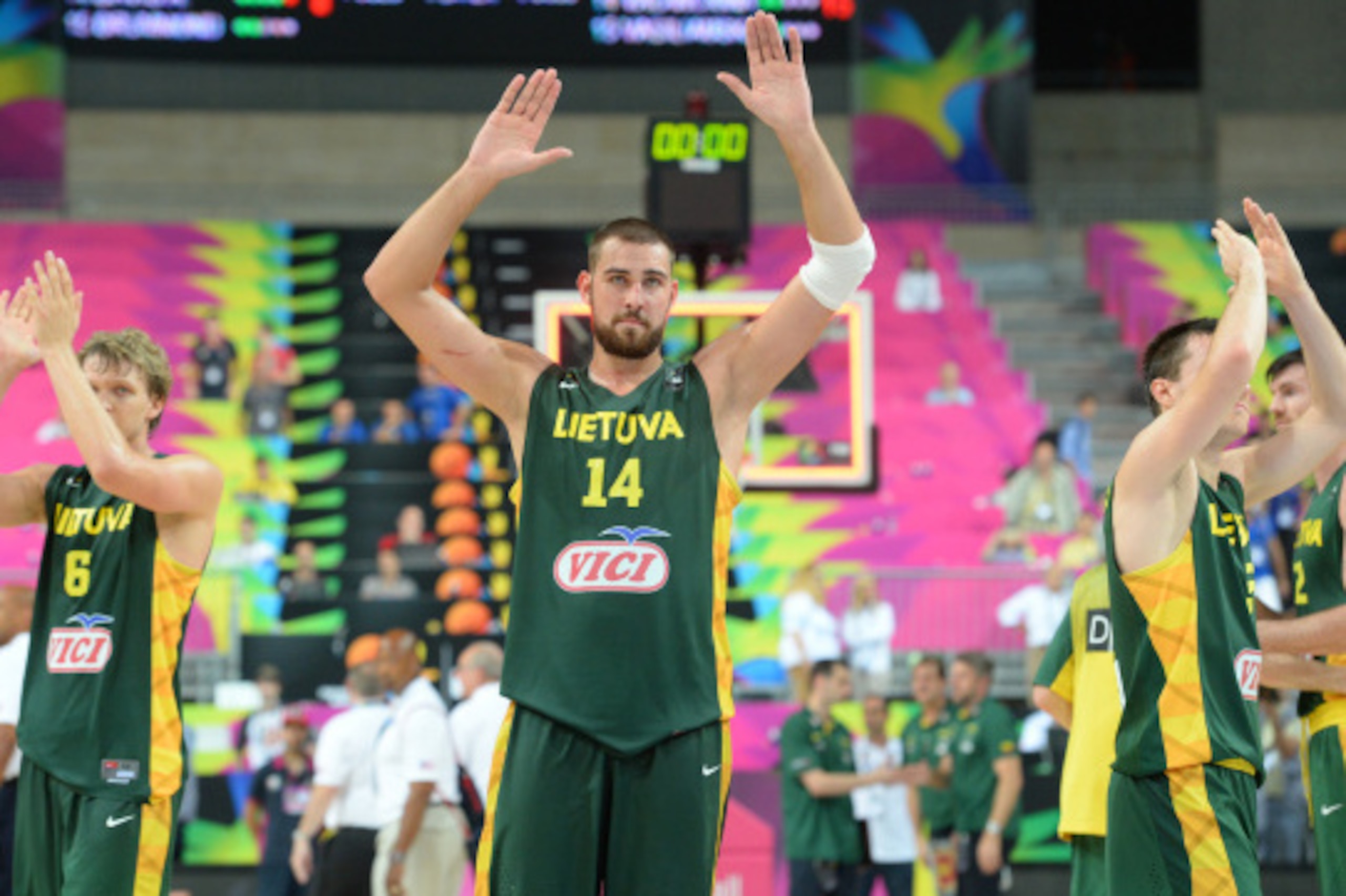 BARCELONA, SPAIN - SEPTEMBER 11: Jonas Valanciunas #14 of the Lithuania National Team waves to the crowd after the game against the USA Basketball Men's National Team during the 2014 FIBA World Cup Semi-Finals at Palau Sant Jordi on September 11, 2014 in 