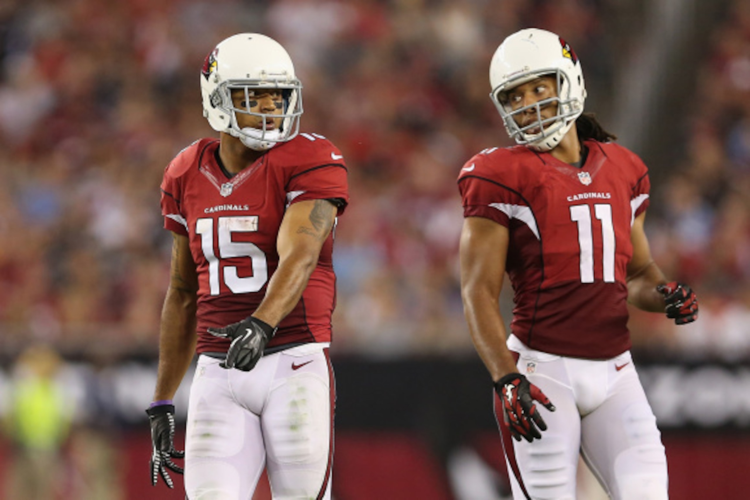 GLENDALE, AZ - SEPTEMBER 08:  Wide receivers Michael Floyd #15 and  Larry Fitzgerald #11 of the Arizona Cardinals during the NFL game against the San Diego Chargers at the University of Phoenix Stadium on September 8, 2014 in Glendale, Arizona.  The Cardi