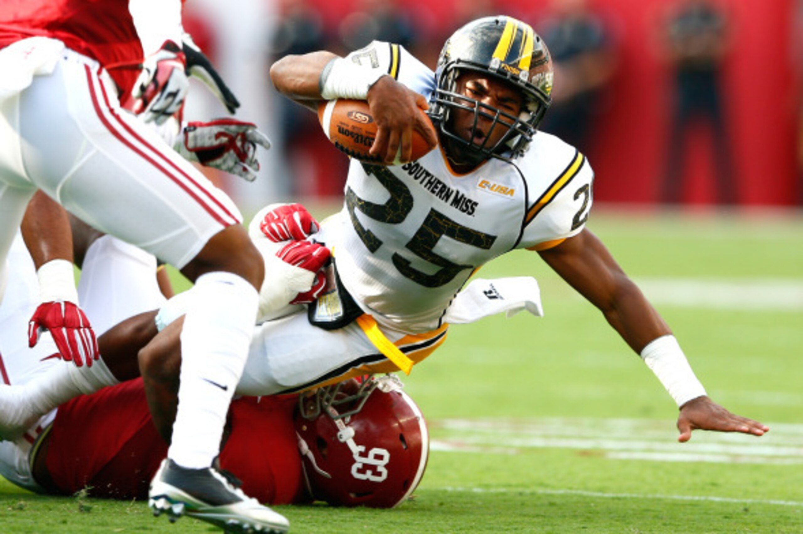 TUSCALOOSA, AL - SEPTEMBER 13:  Jonathan Allen #93 of the Alabama Crimson Tide tackles Ito Smith #25 of the Southern Miss Golden Eagles at Bryant-Denny Stadium on September 13, 2014 in Tuscaloosa, Alabama.  (Photo by Kevin C. Cox/Getty Images)