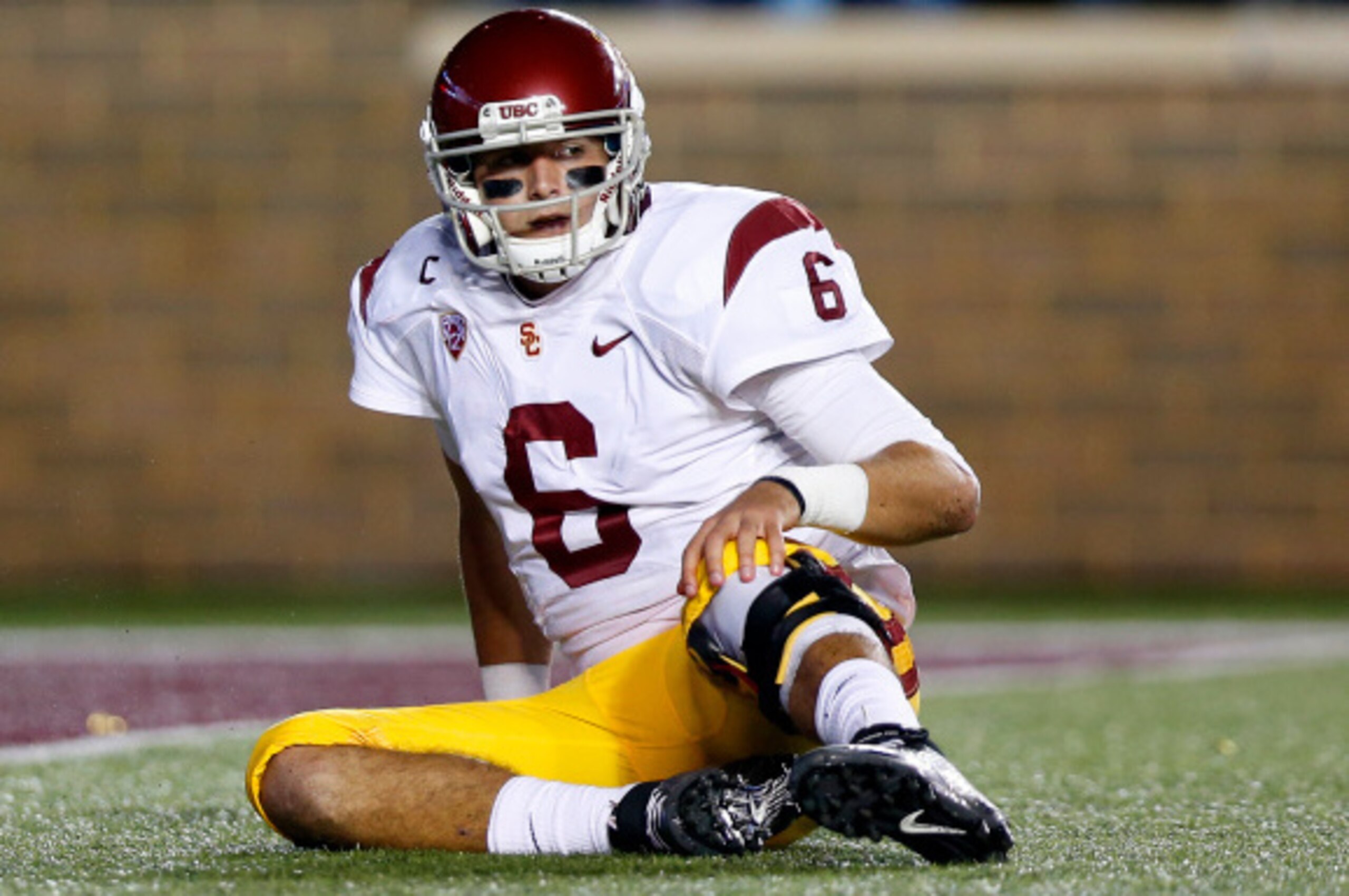 BOSTON, MA- SEPTEMBER 13: Quarterback Cody Kessler #6 of the USC Trojans sits on the turf after being sacked by the Boston College Eagles during the first half at Alumni Stadium on September 13 in Chestnut Hill, Massachusetts. (Photo by Winslow Townson/ BOSTON, MA- SEPTEMBER 13: Quarterback Cody Kessler #6 of the USC Trojans sits on the turf after being sacked by the Boston College Eagles during the first half at Alumni Stadium on September 13 in Chestnut Hill, Massachusetts. (Photo by Winslow Townson/