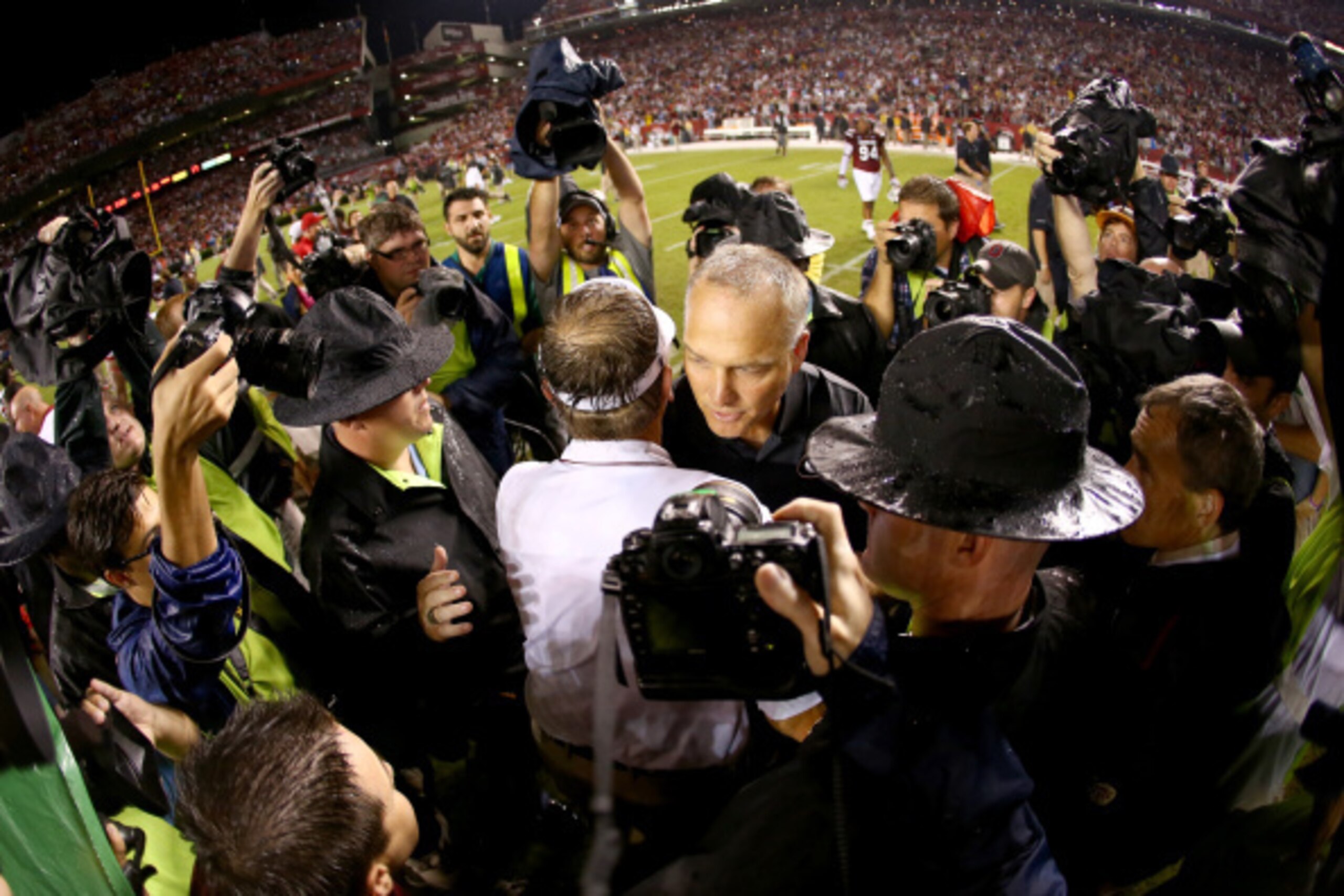 COLUMBIA, SC - SEPTEMBER 13:  (L-R) Head coach Steve Spurrier of the South Carolina Gamecocks shakes hands with head coach Mark Richt of the Georgia Bulldogs after their game at Williams-Brice Stadium on September 13, 2014 in Columbia, South Carolina.  (P