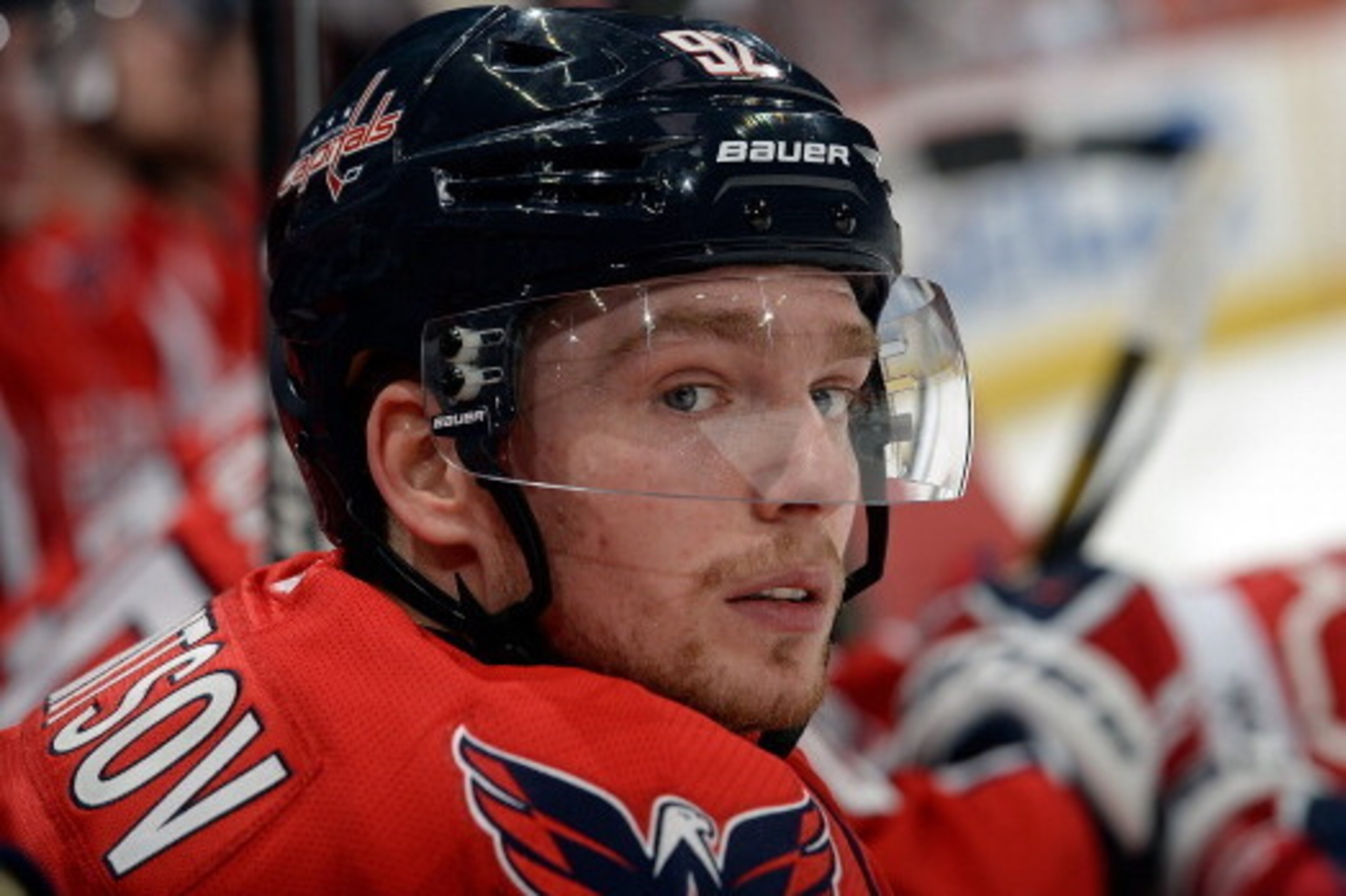 WASHINGTON, DC - MARCH 25:  Evgeny Kuznetsov #92 of the Washington Capitals reacts on the bench after scoring his first career NHL goal in the third period during an NHL game against the Los Angeles Kings at Verizon Center on March 25, 2014 in Washington,