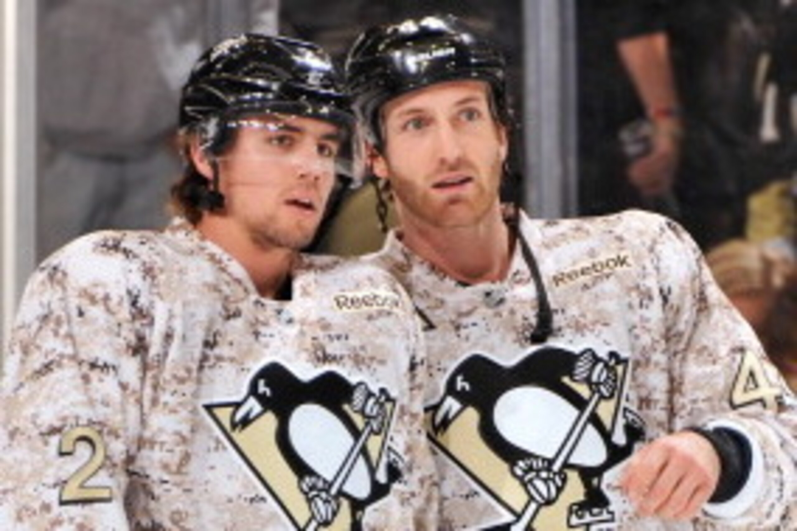 PITTSBURGH, PA - NOVEMBER 11:  Matt Niskanen #2 and Brooks Orpik #44, both of the Pittsburgh Penguins, warm up in camouflage jerseys to honor Veteran's Day before a game against the Dallas Stars on November 11, 2011 at CONSOL Energy Center in Pittsburgh, 
