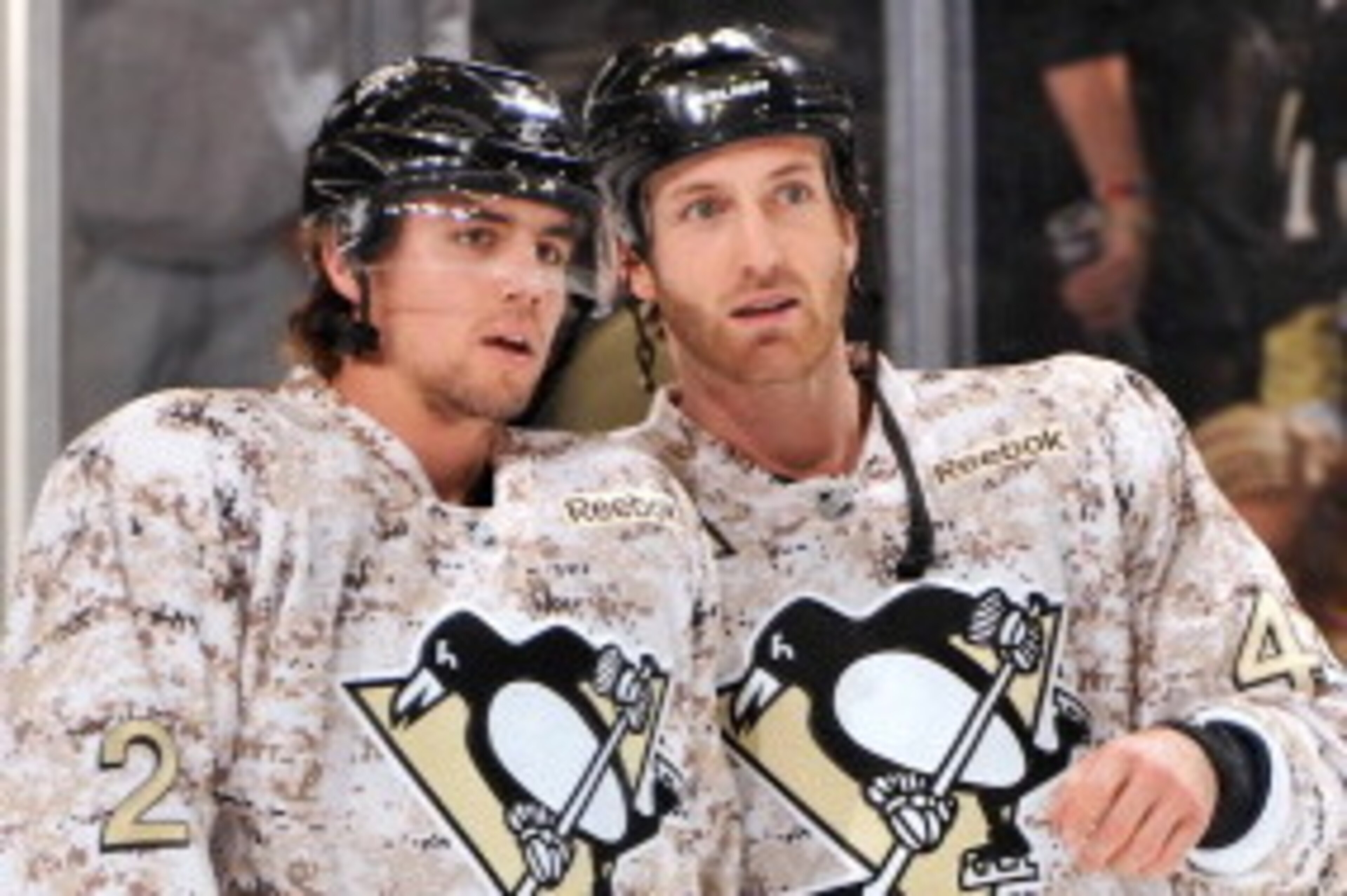 PITTSBURGH, PA - NOVEMBER 11:  Matt Niskanen #2 and Brooks Orpik #44, both of the Pittsburgh Penguins, warm up in camouflage jerseys to honor Veteran's Day before a game against the Dallas Stars on November 11, 2011 at CONSOL Energy Center in Pittsburgh, 