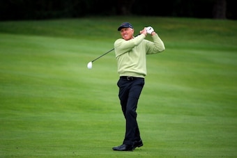 CRANS, SWITZERLAND - AUGUST 30:  Greg Norman of Australia in action during the first round of the Omega European Masters at Crans-sur-Sierre Golf Club on August 30, 2012 in Crans, Switzerland.  (Photo by Richard Heathcote/Getty Images)