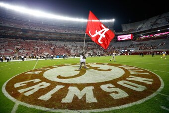 TUSCALOOSA, AL - SEPTEMBER 13:  Big Al, mascot of the Alabama Crimson Tide, waves the flag after their 52-12 win over the Southern Miss Golden Eagles at Bryant-Denny Stadium on September 13, 2014 in Tuscaloosa, Alabama.  (Photo by Kevin C. Cox/Getty Image