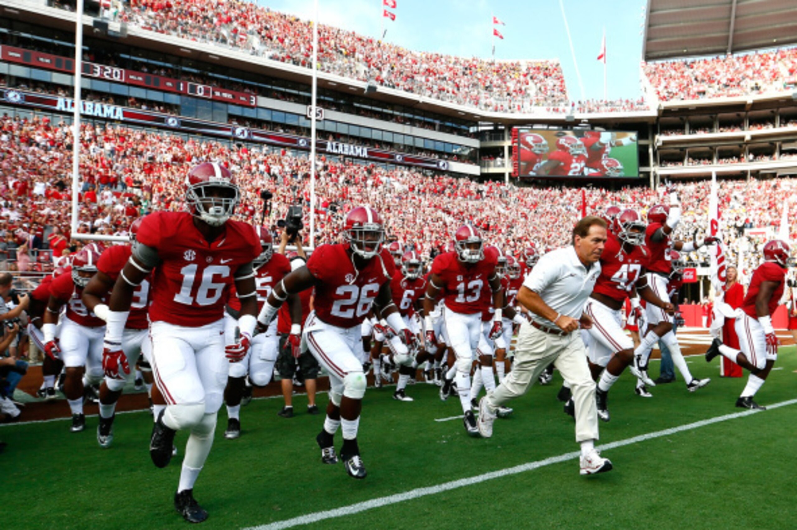TUSCALOOSA, AL - SEPTEMBER 13:  Head coach Nick Saban of the Alabama Crimson Tide leads his team on the field to face the Southern Miss Golden Eagles at Bryant-Denny Stadium on September 13, 2014 in Tuscaloosa, Alabama.  (Photo by Kevin C. Cox/Getty Image