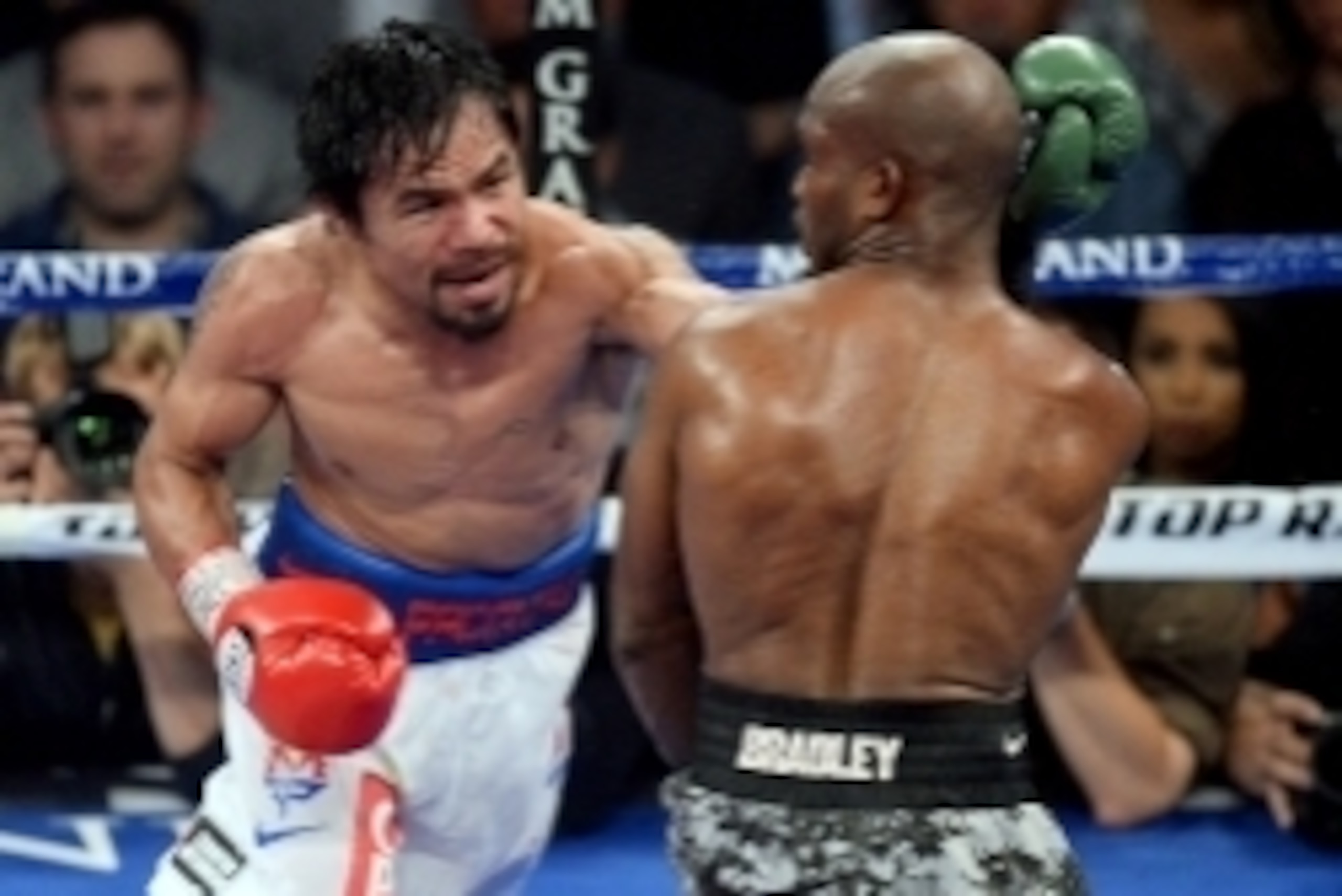 Apr 12, 2014; Las Vegas, NV, USA; Timothy Bradley (green gloves) and Manny Pacquiao (red gloves) box during their WBO World Welterweight Title bout at MGM Grand Garden Arena. Pacquiao won via unanimous decision. Mandatory Credit: Joe Camporeale-USA TODAY Apr 12, 2014; Las Vegas, NV, USA; Timothy Bradley (green gloves) and Manny Pacquiao (red gloves) box during their WBO World Welterweight Title bout at MGM Grand Garden Arena. Pacquiao won via unanimous decision. Mandatory Credit: Joe Camporeale-USA TODAY