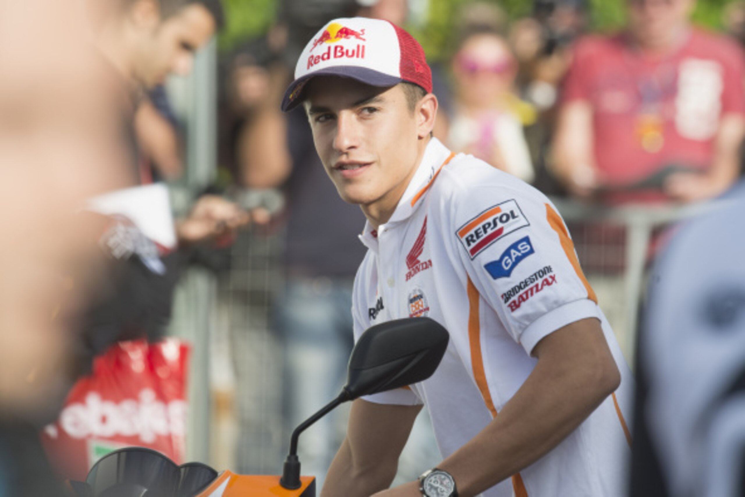MISANO ADRIATICO, ITALY - SEPTEMBER 11:  Marc Marquez of Spain and Repsol Honda Team rides the scooter in paddock during the MotoGP of San Marino - Previews at Misano World Circuit on September 11, 2014 in Misano Adriatico, Italy.  (Photo by Mirco Lazzari
