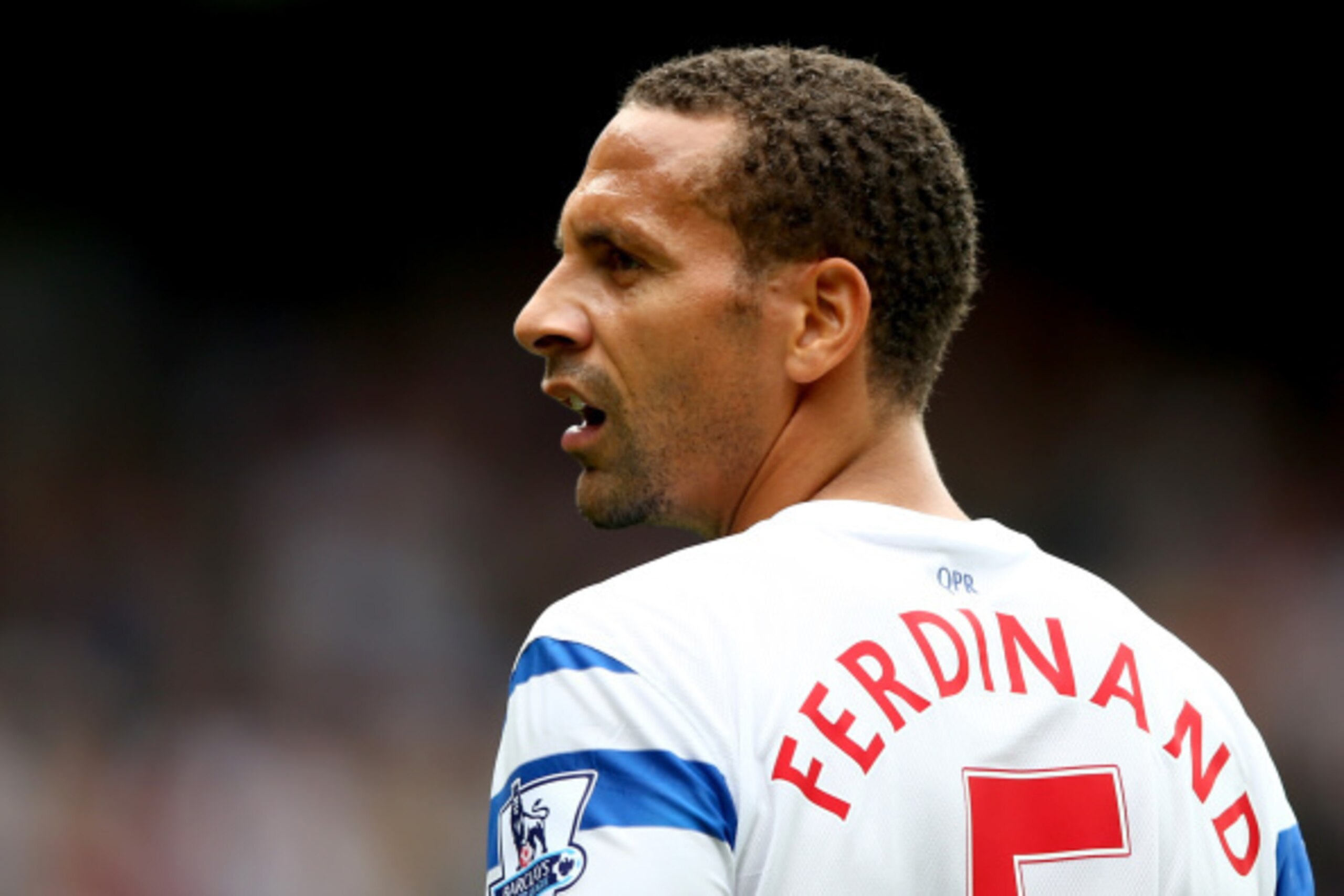 LONDON, ENGLAND - AUGUST 30:  Rio Ferdinand of QPR during the Barclays Premier League match between Queens Park Rangers and Sunderland at Loftus Road on August 30, 2014 in London, England.  (Photo by Clive Rose/Getty Images)