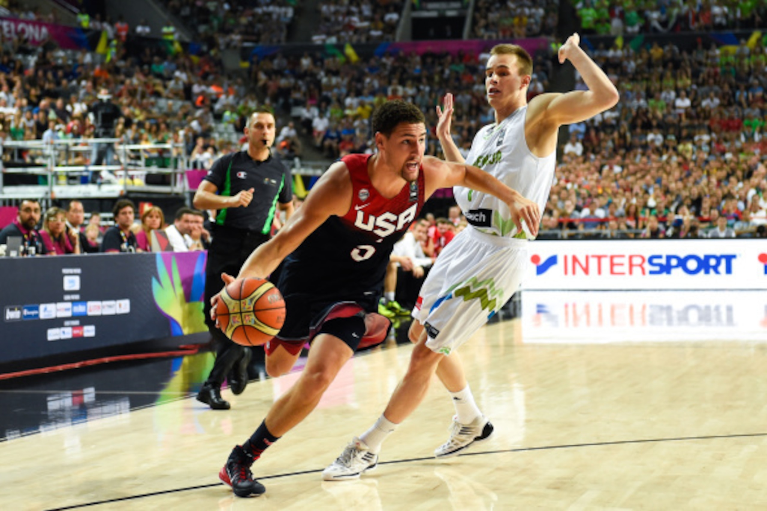 BARCELONA, SPAIN - SEPTEMBER 09: Klay Thompson #5 of the USA Basketball Men's National Team runs with the ball against Klemen Prepelic #7 of the Slovenia Basketball Men's National Team during 2014 FIBA Basketball World Cup quarter-final match between Slo BARCELONA, SPAIN - SEPTEMBER 09: Klay Thompson #5 of the USA Basketball Men's National Team runs with the ball against Klemen Prepelic #7 of the Slovenia Basketball Men's National Team during 2014 FIBA Basketball World Cup quarter-final match between Slo