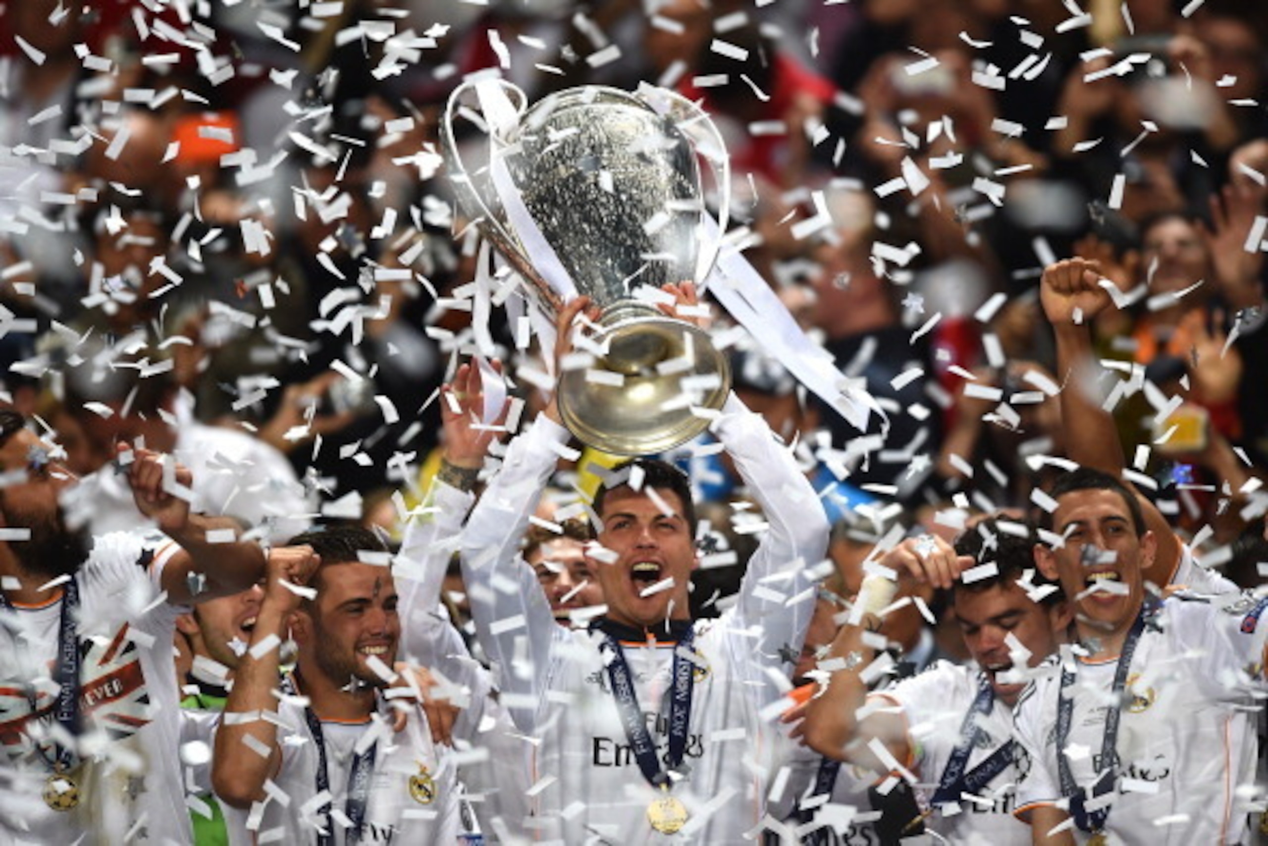 LISBON, PORTUGAL - MAY 24:  Cristiano Ronaldo of Real Madrid lifts the Champions league trophy during the UEFA Champions League Final between Real Madrid and Atletico de Madrid at Estadio da Luz on May 24, 2014 in Lisbon, Portugal.  (Photo by Laurence Gri