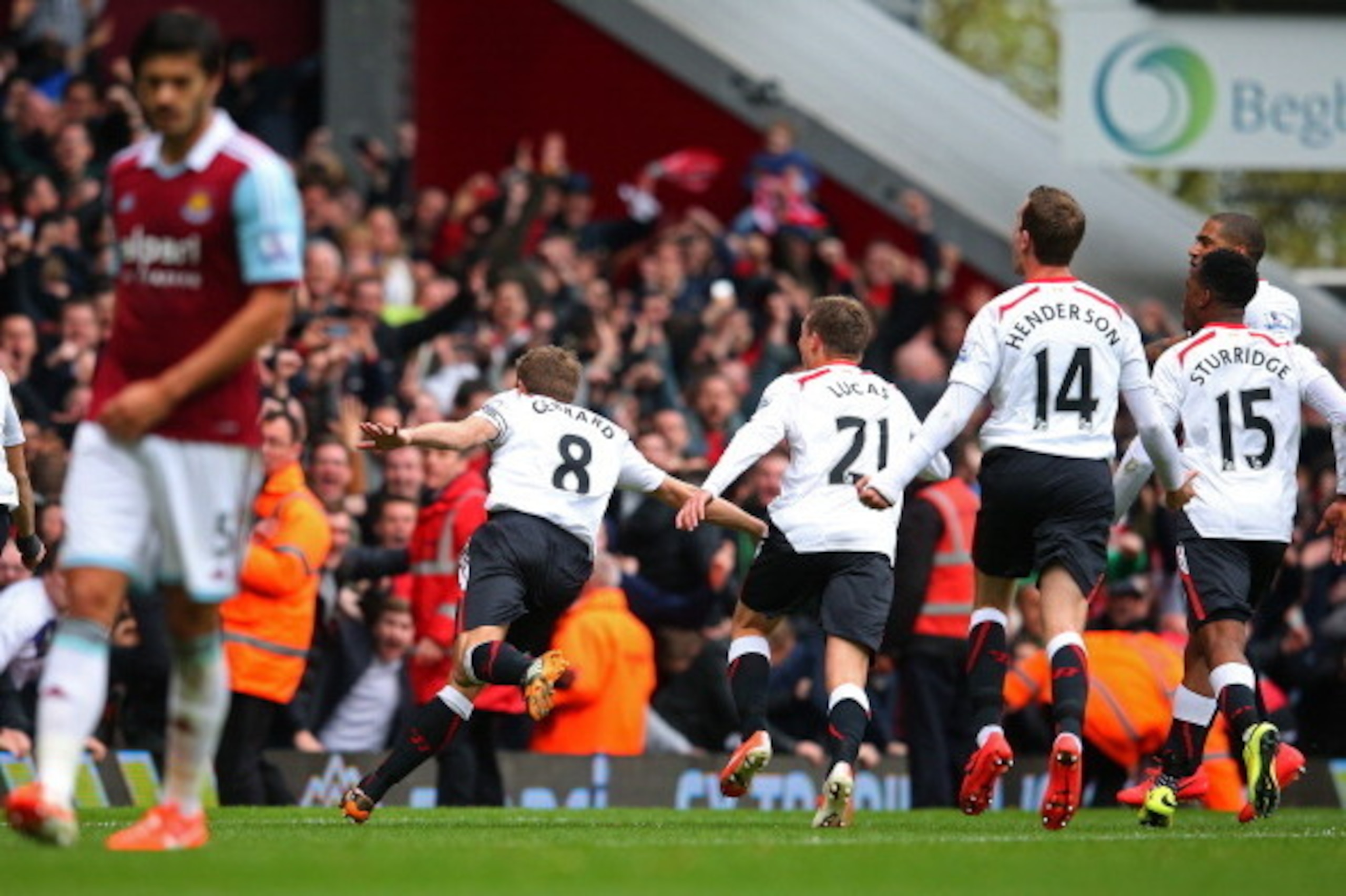LONDON, ENGLAND - APRIL 06: Steven Gerrard #8 of Liverpool celebrates after scoring his team's second goal from the penalty spot during the Barclays Premier League match between West Ham United and Liverpool at Boleyn Ground on April 6, 2014 in London, E LONDON, ENGLAND - APRIL 06: Steven Gerrard #8 of Liverpool celebrates after scoring his team's second goal from the penalty spot during the Barclays Premier League match between West Ham United and Liverpool at Boleyn Ground on April 6, 2014 in London, E