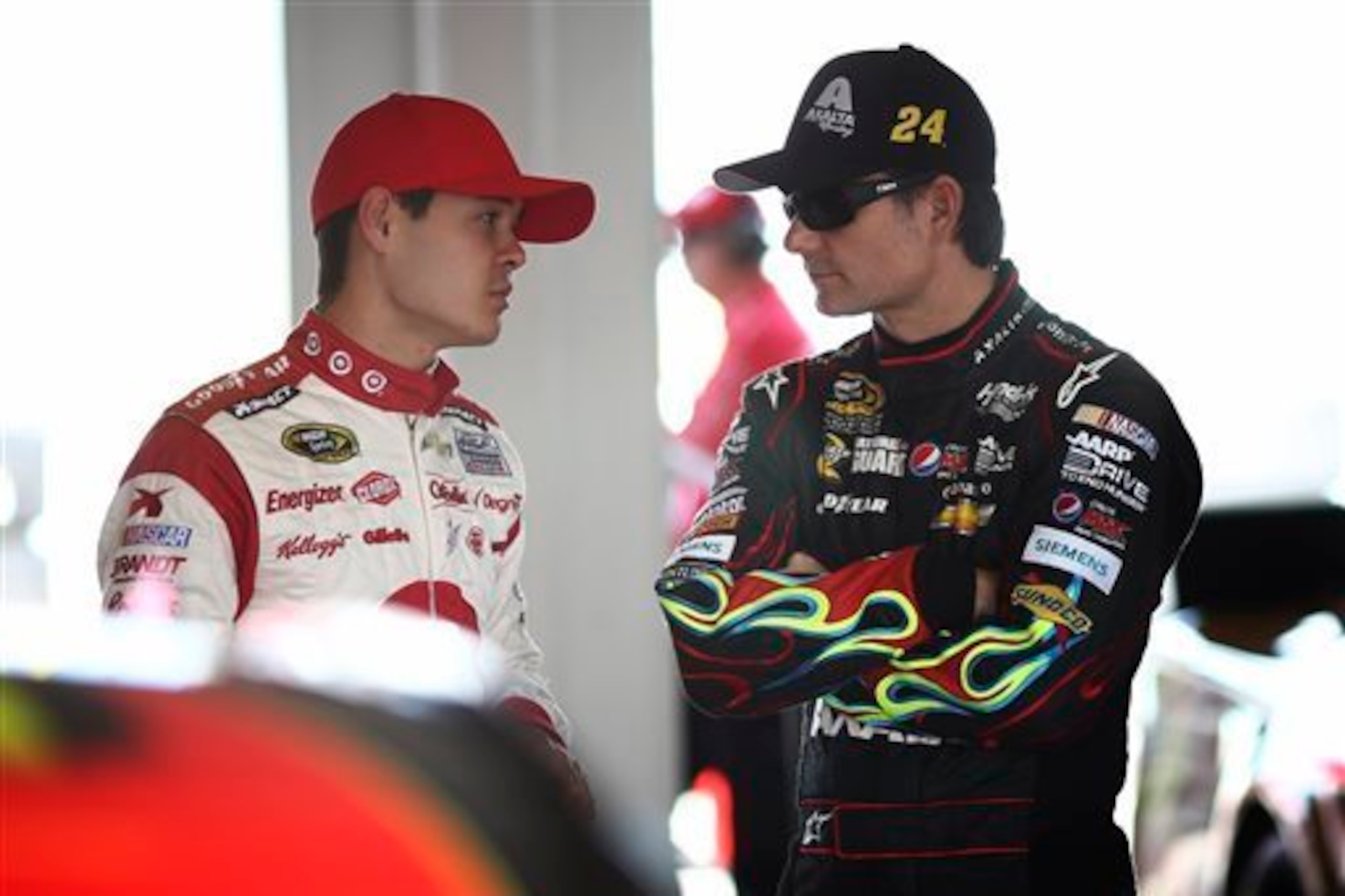 Jeff Gordon (right) and rookie Kyle Larson finished second and third respectively on Sunday.